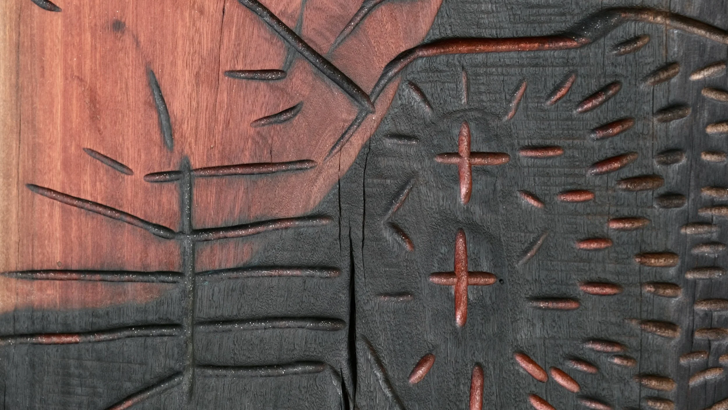 Reclaimed Blue Gum Shou Sugi Ban ceremonial table with carved symbols and red pigment — Kitsune Moon Byron Bay