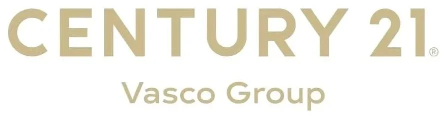 Century 21 Vasco Group logo in beige and gold text.