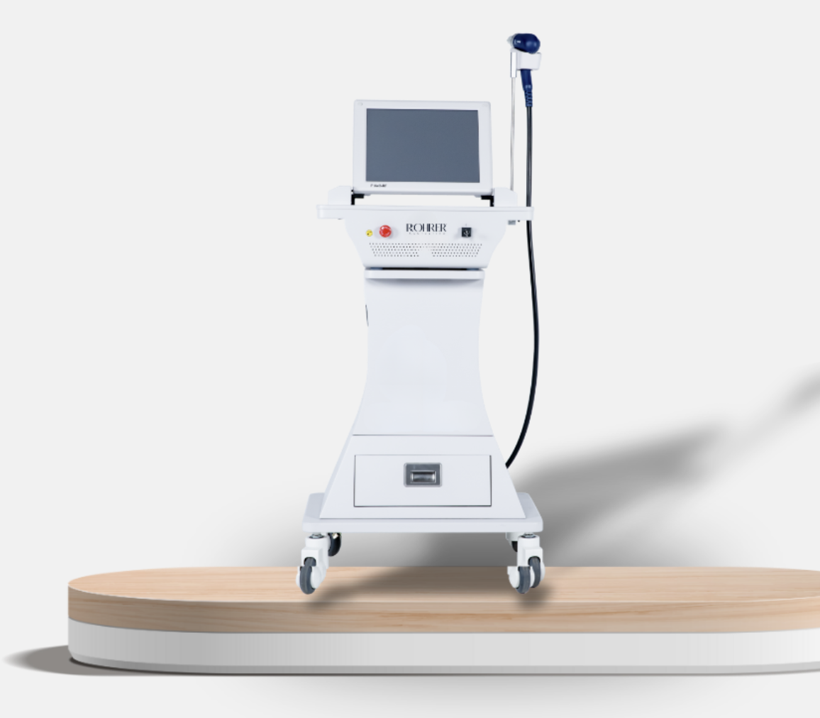 Medical laser or light therapy machine on a wooden platform with a neutral background.