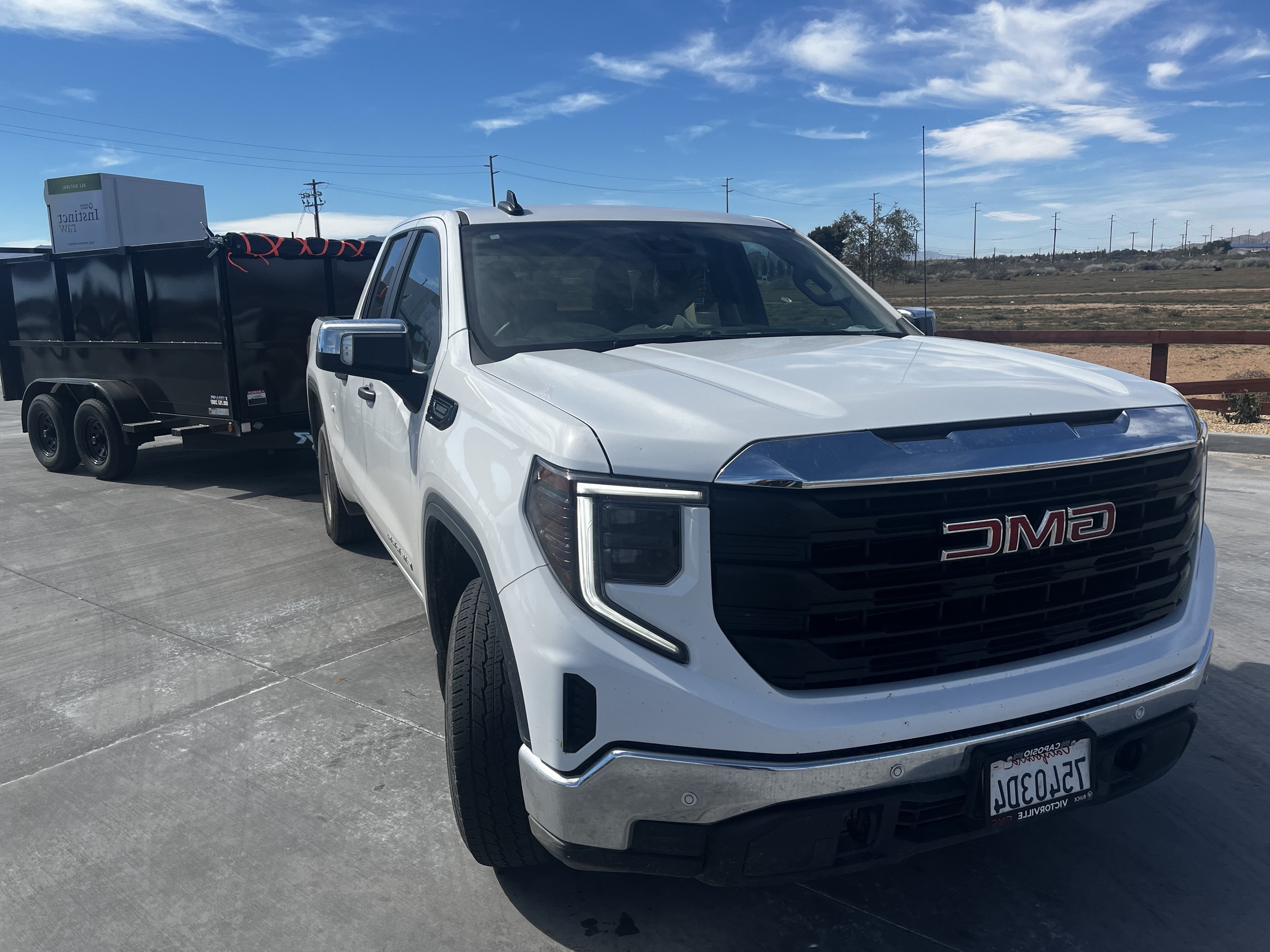 Cost Less Junk Removal's 8x12x4 dump trailer ready for a junk removal job in Victorville