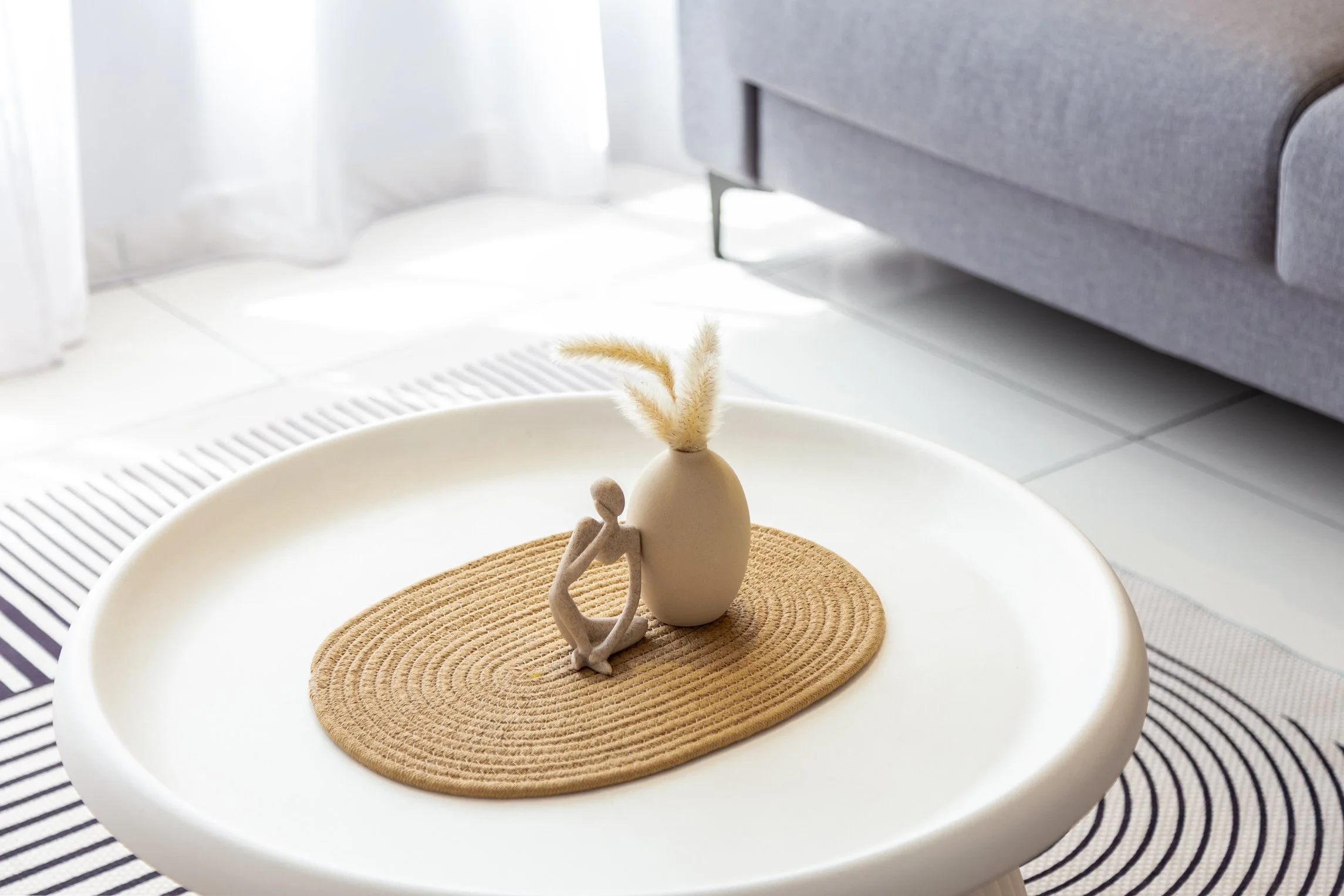Minimalist coffee table styling in a professionally designed Airbnb at Gaia Residences by Sleepy Bear