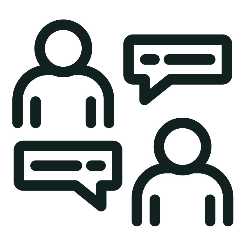 Icon of two people, one speaking with a speech bubble and the other listening with a speech bubble