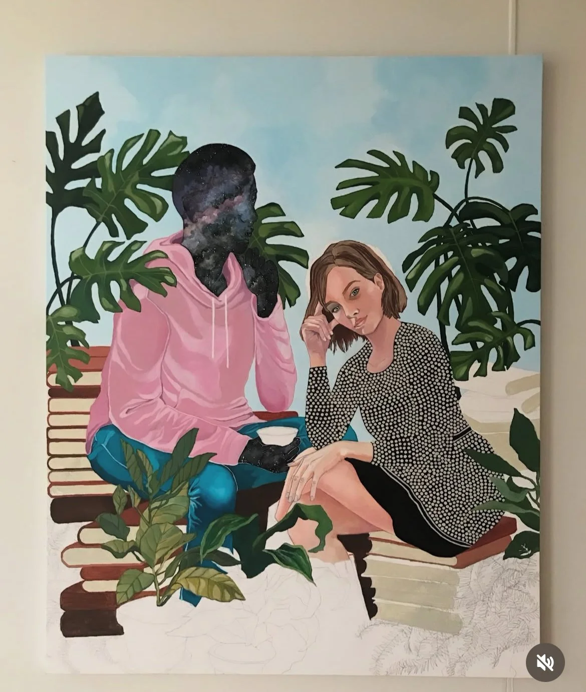 A live wedding painting of a happy wedding couple sitting on a wooden bench among large green tropical plants at their destination wedding. 