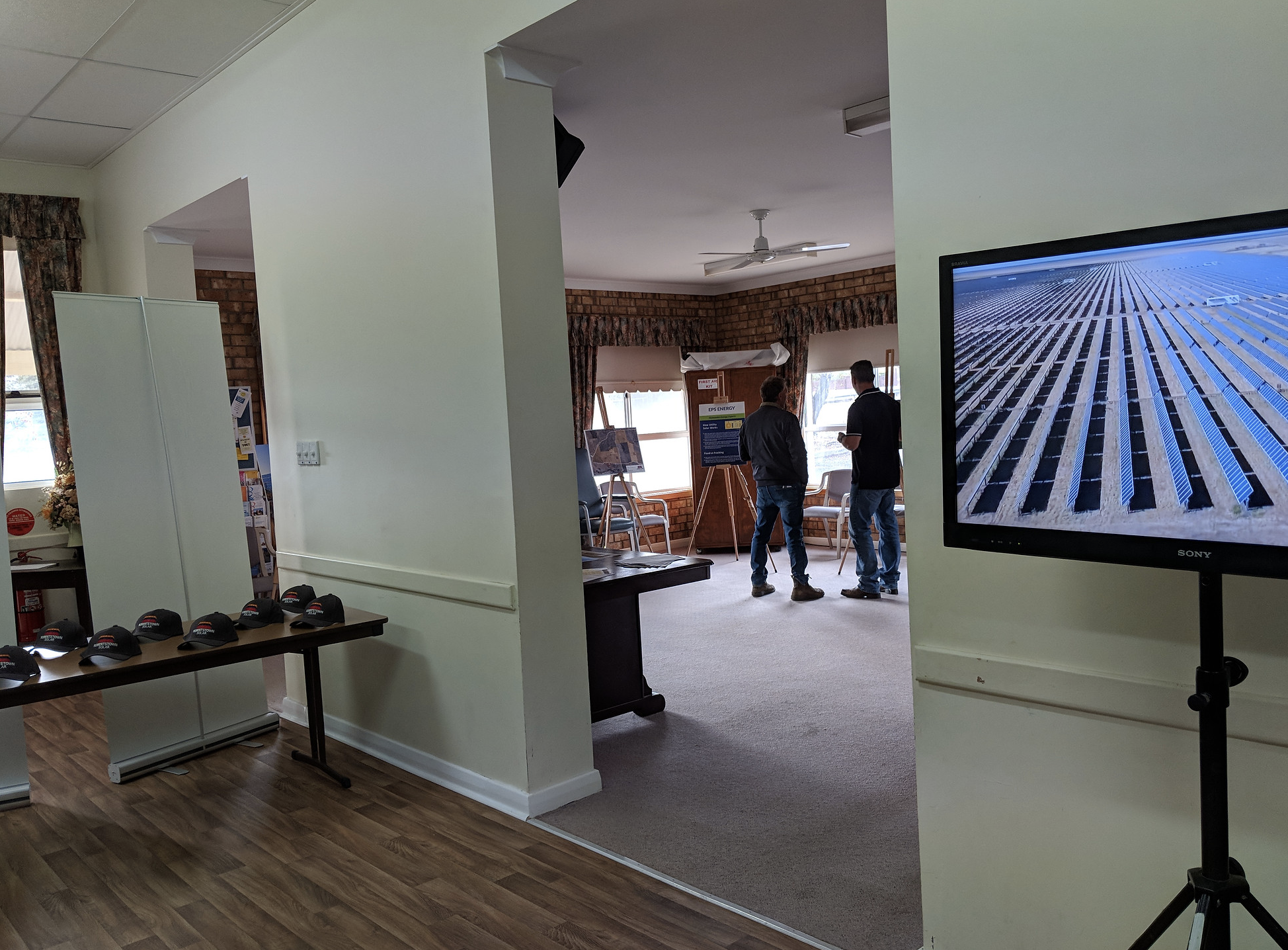 Revera Energy Robertstown Project image of community engagement event with slideshow visual