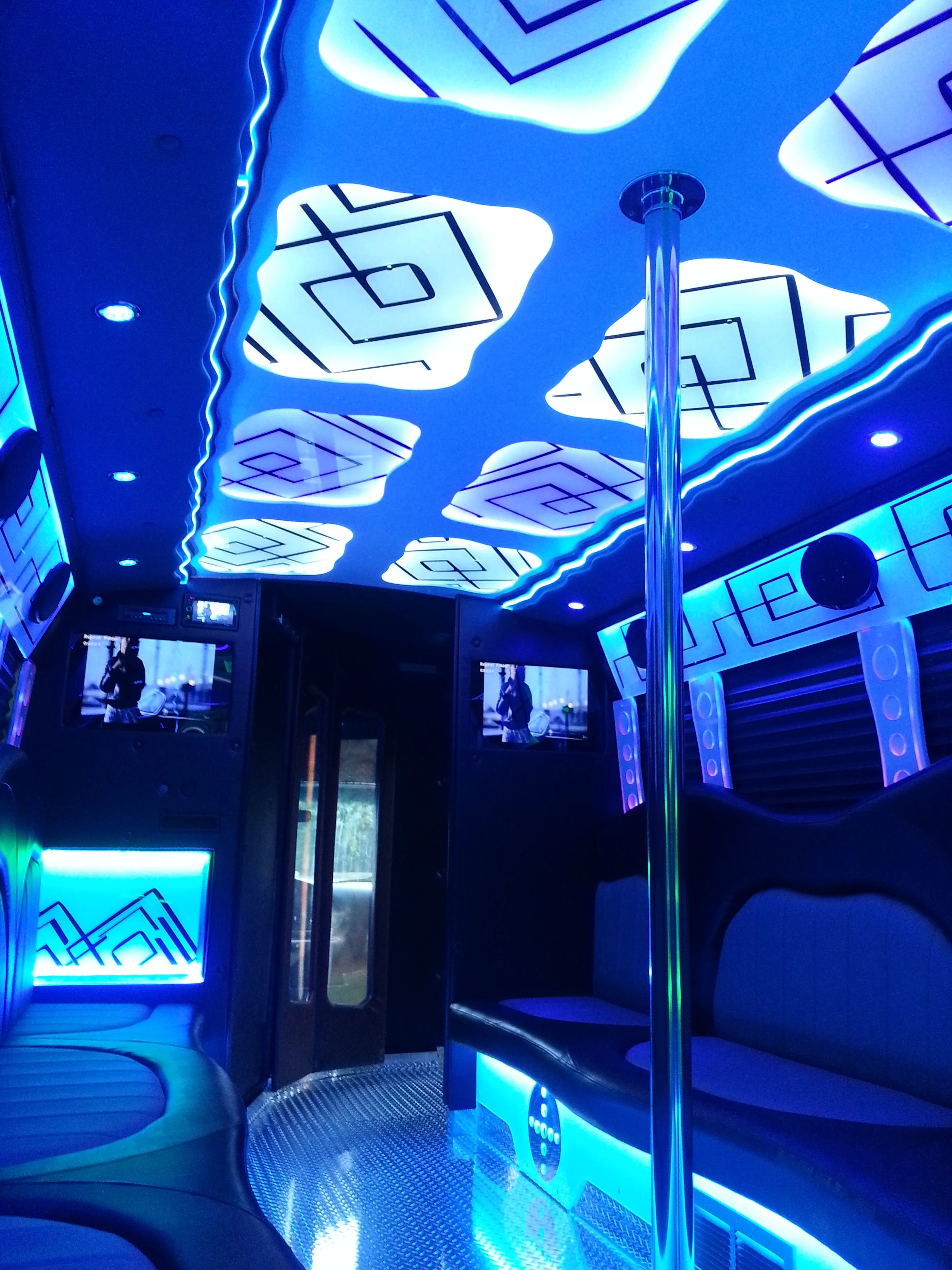 Party bus 20 passengers Chicago interior with TVs and seating