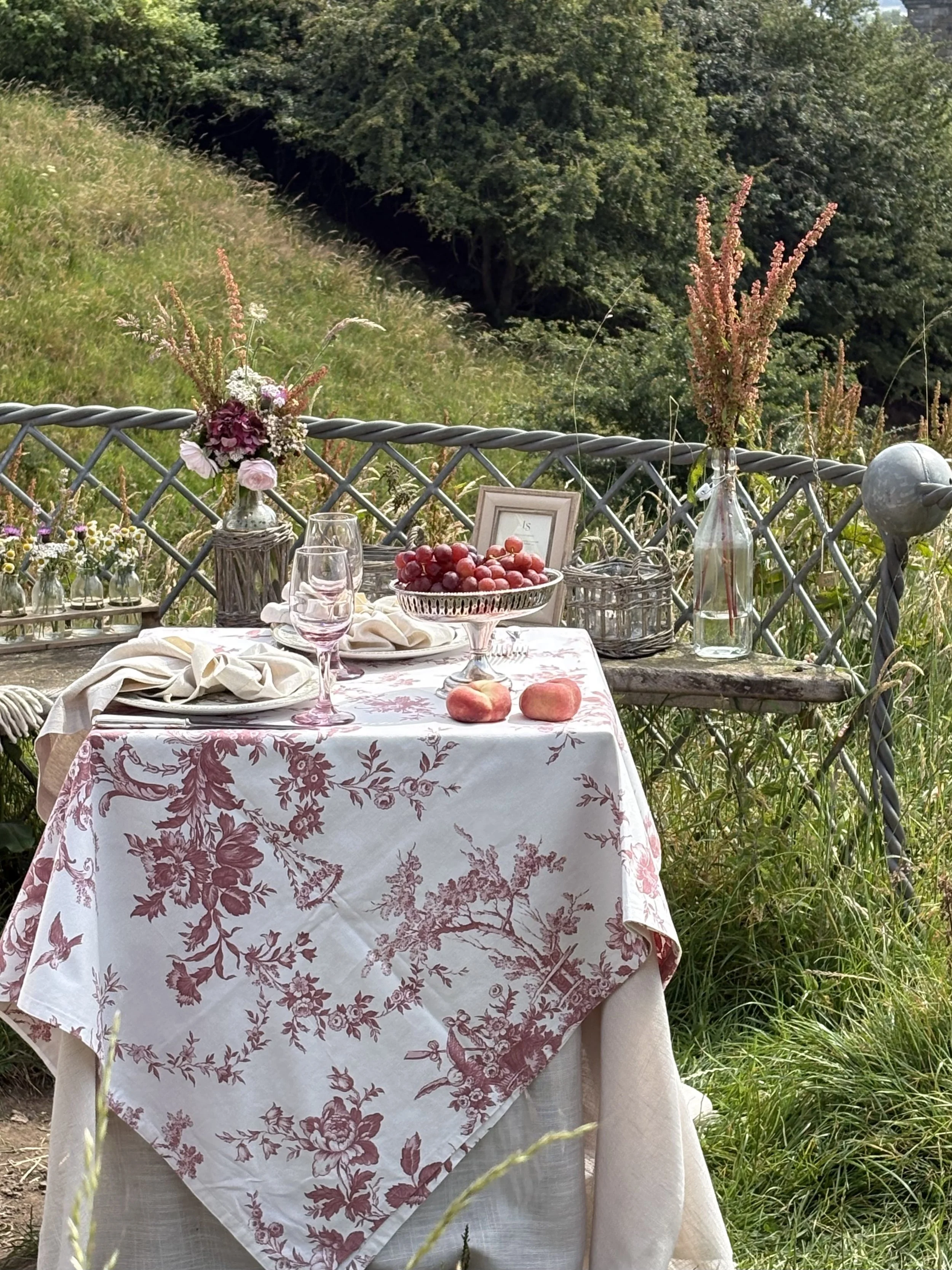 Table detail with bench in background.jpg
