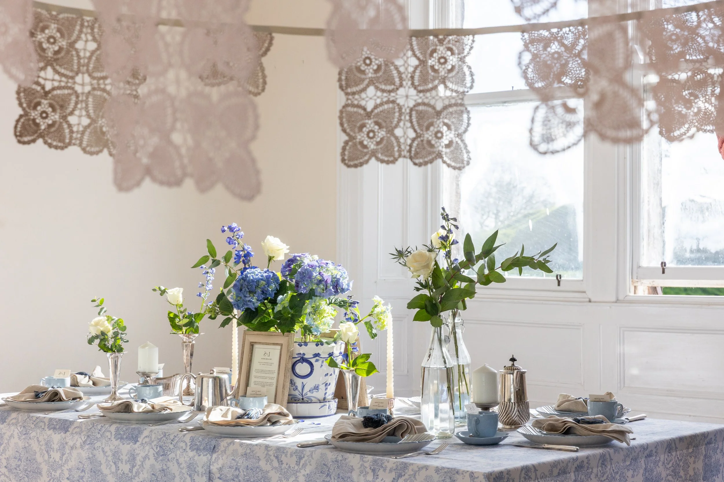 Refined indoor tablescape styling in Berwick-upon-Tweed featuring seasonal florals, layered textures and bespoke details for intimate gatherings in Northumberland and Scottish Borders.