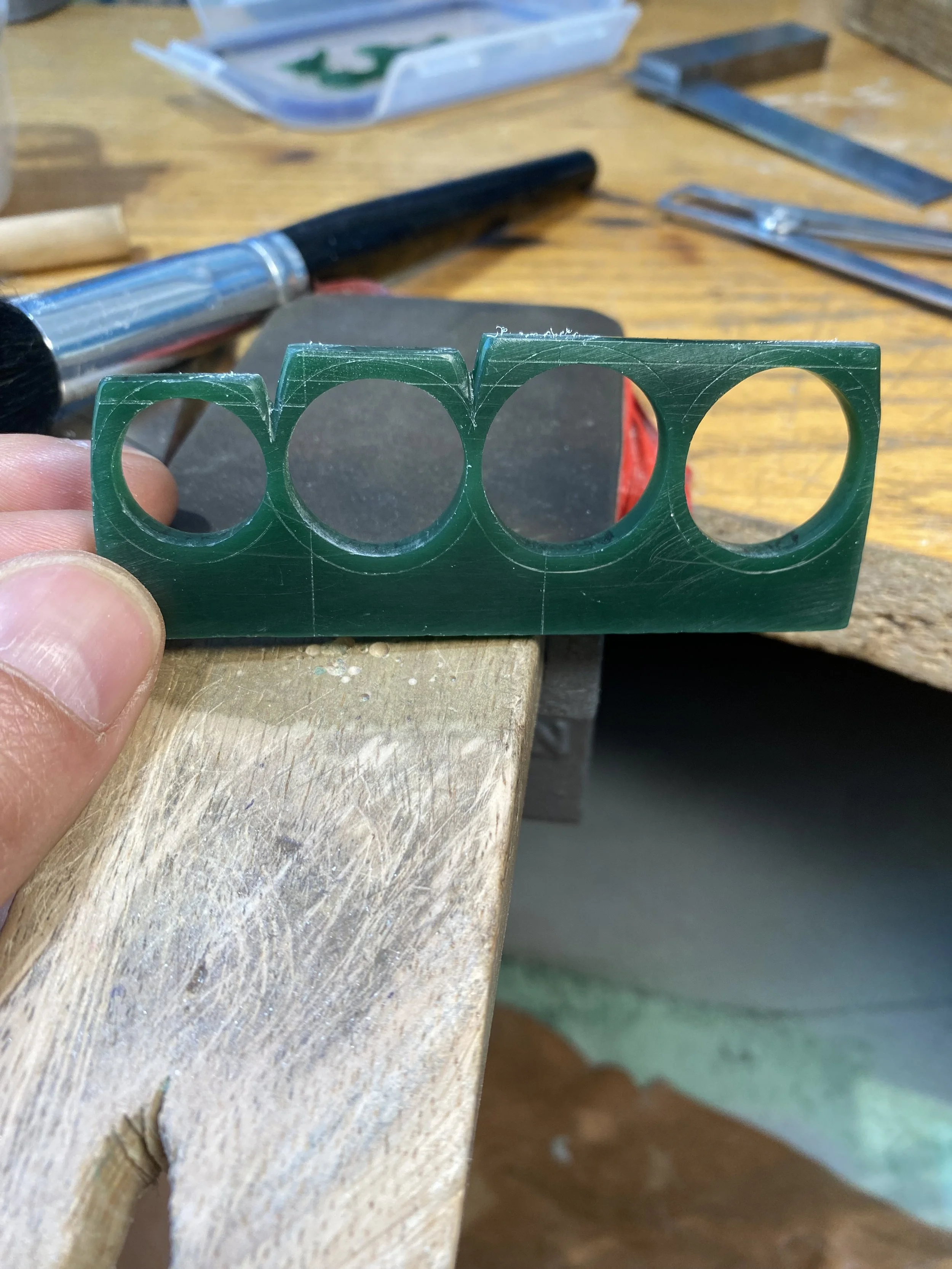 Ensuring there is a slight sweep to the four finger holes will ensure a comfortable wearable piece. 