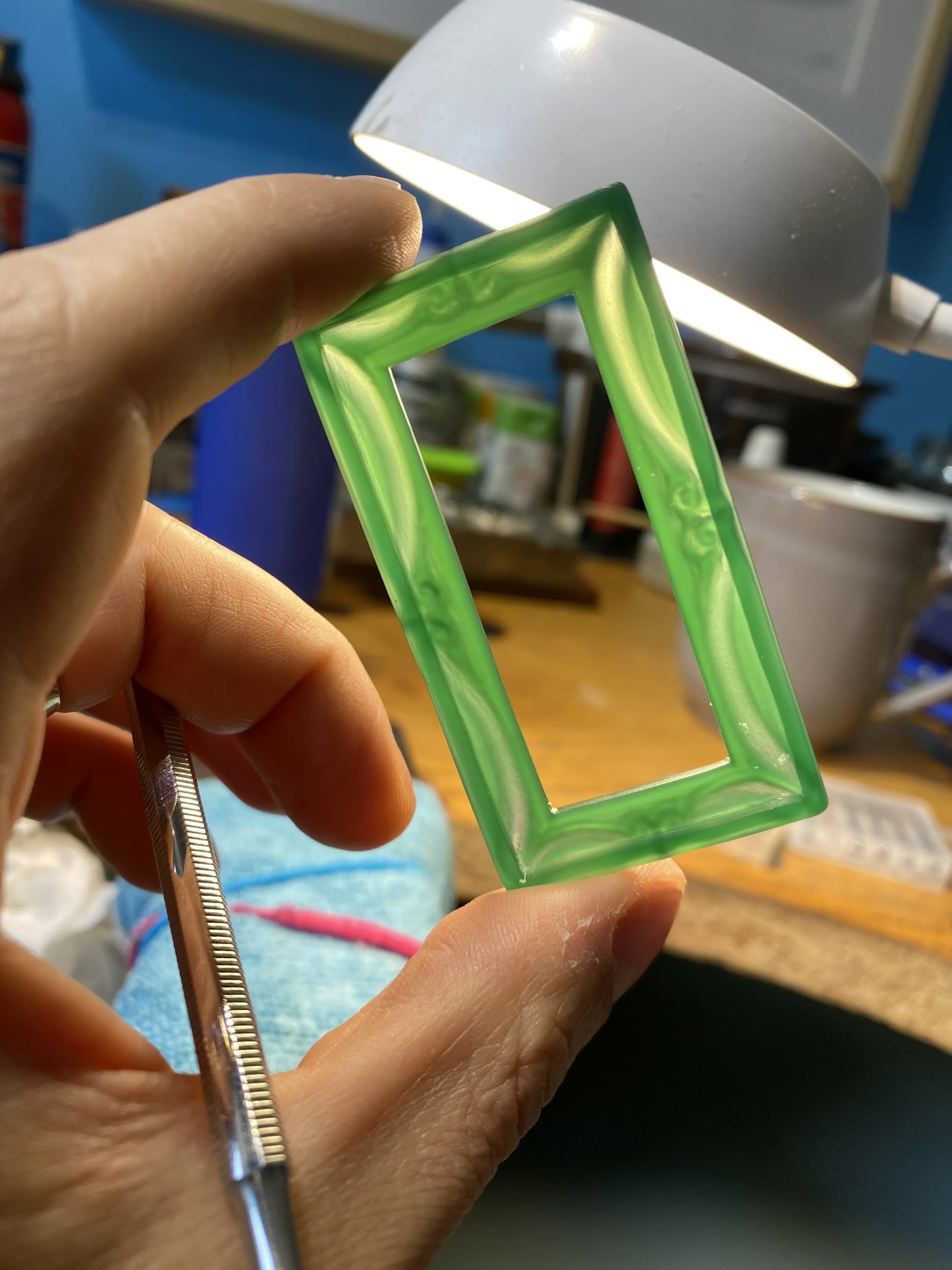 Here you can see the back of the carving which is recessed to allow the backplate to be fitted. I actual added a sheet of think Pink dental wax to the recessed interior as I had a fear that the casting process wouldn't flow properly. 