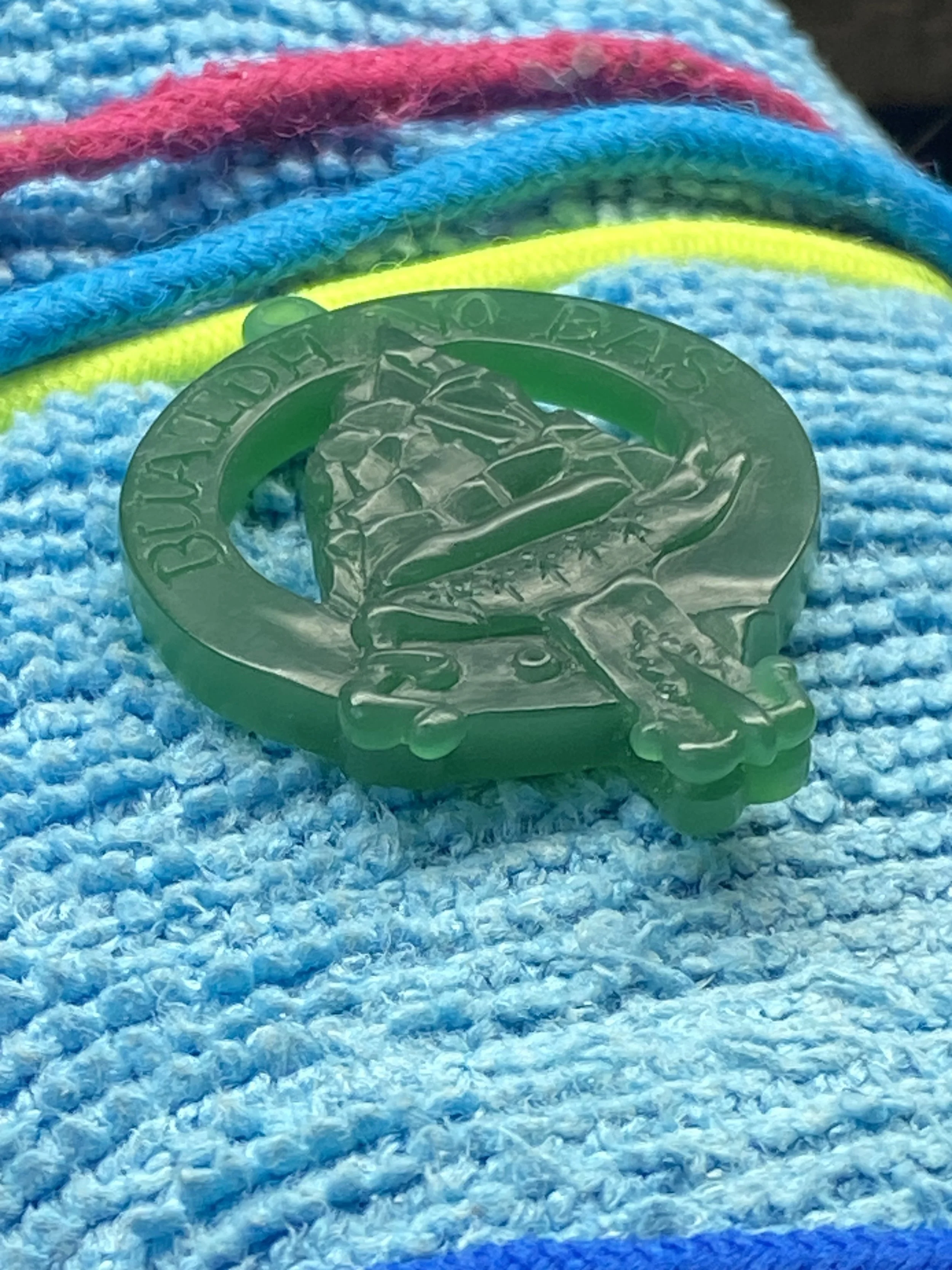 Further refining of the design and smoothing of the different aspects of the family crest. Creating additional flow to the belt around the belt buckle.