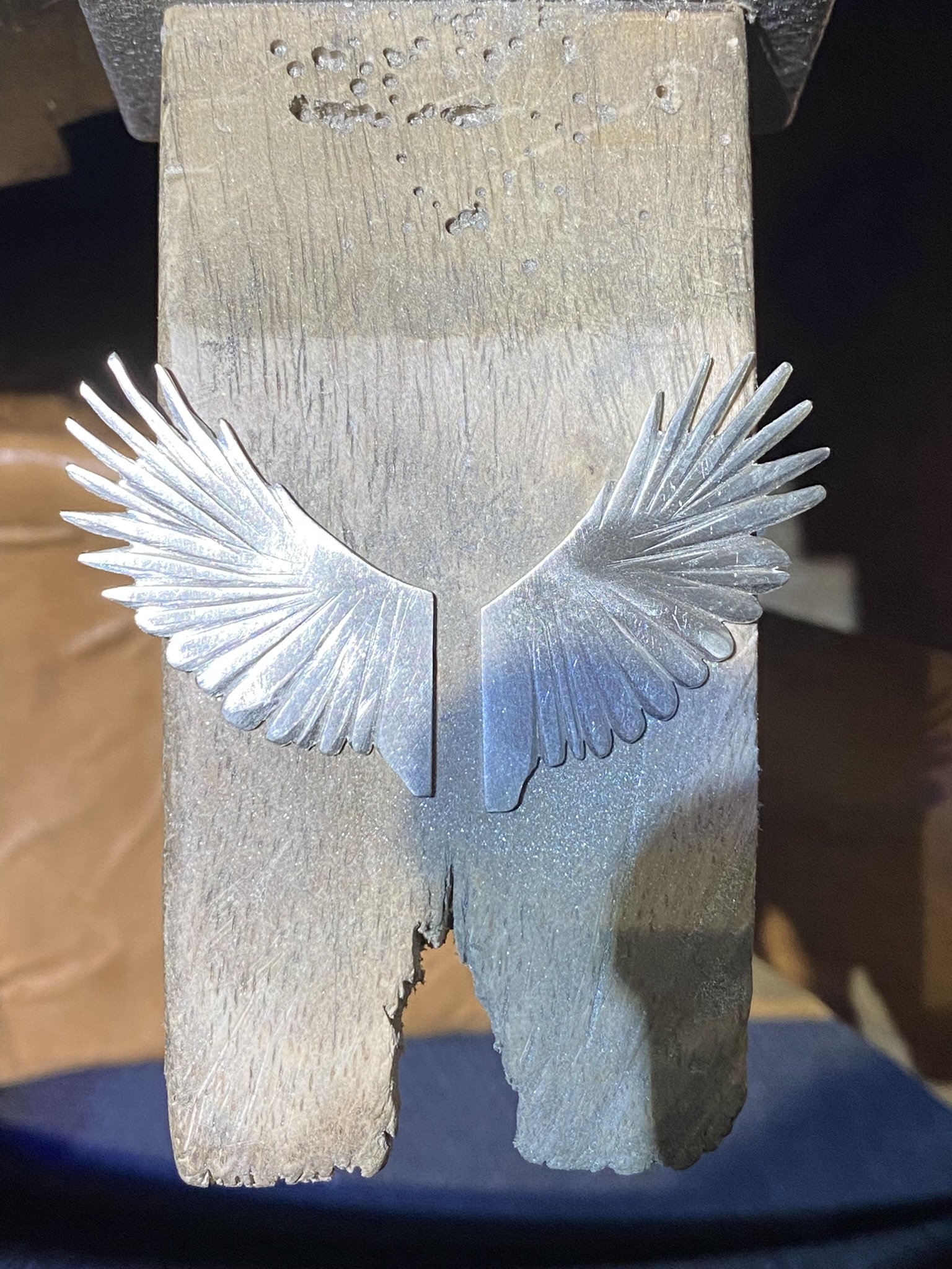 Hand carving the two wings to match the template. I like how they are slightly different. 