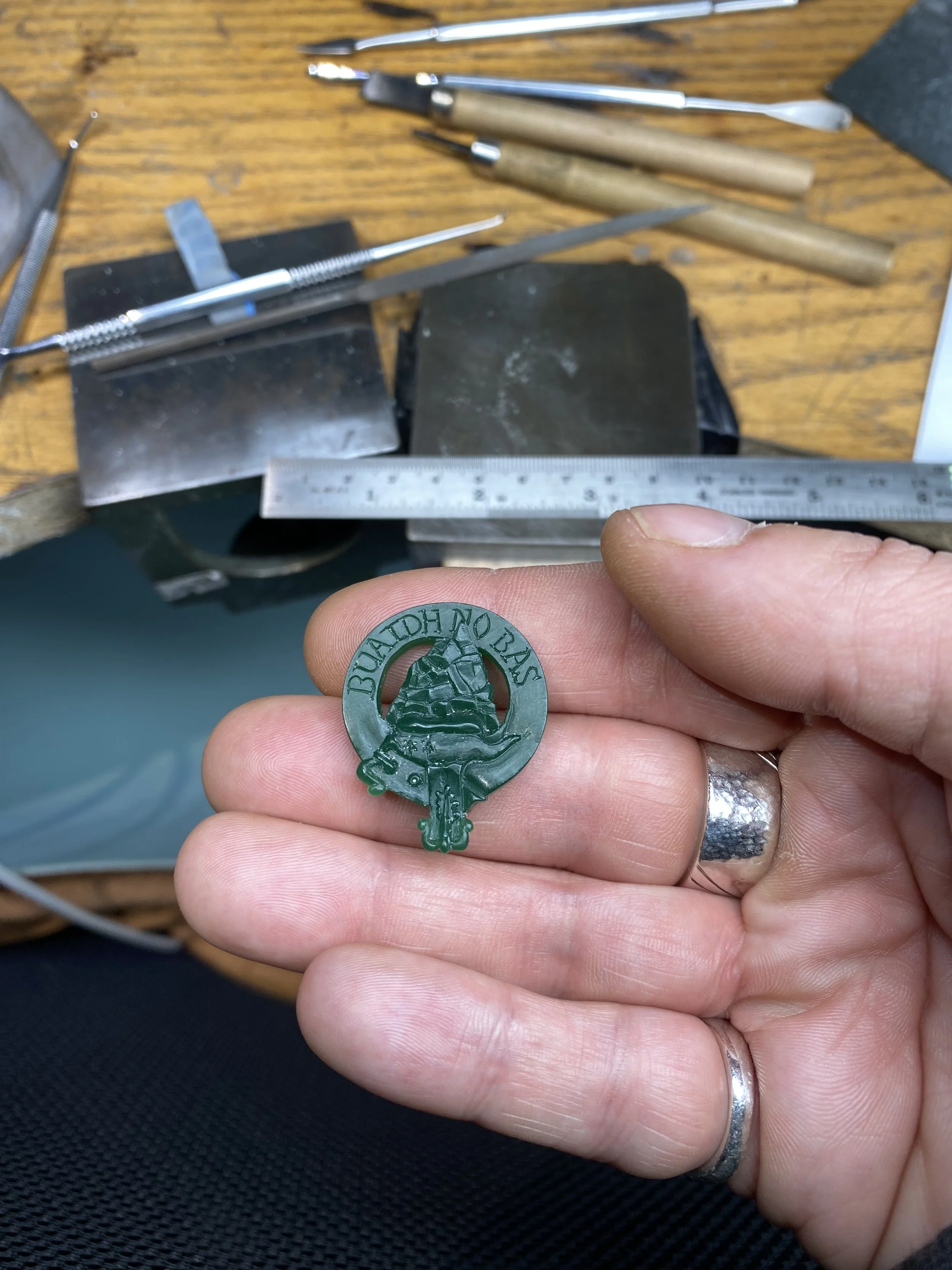 Working on the lettering to ensure this flows correctly and is centralised to the top of the banner. The ermine on the cap was the hardest section to perfect! 