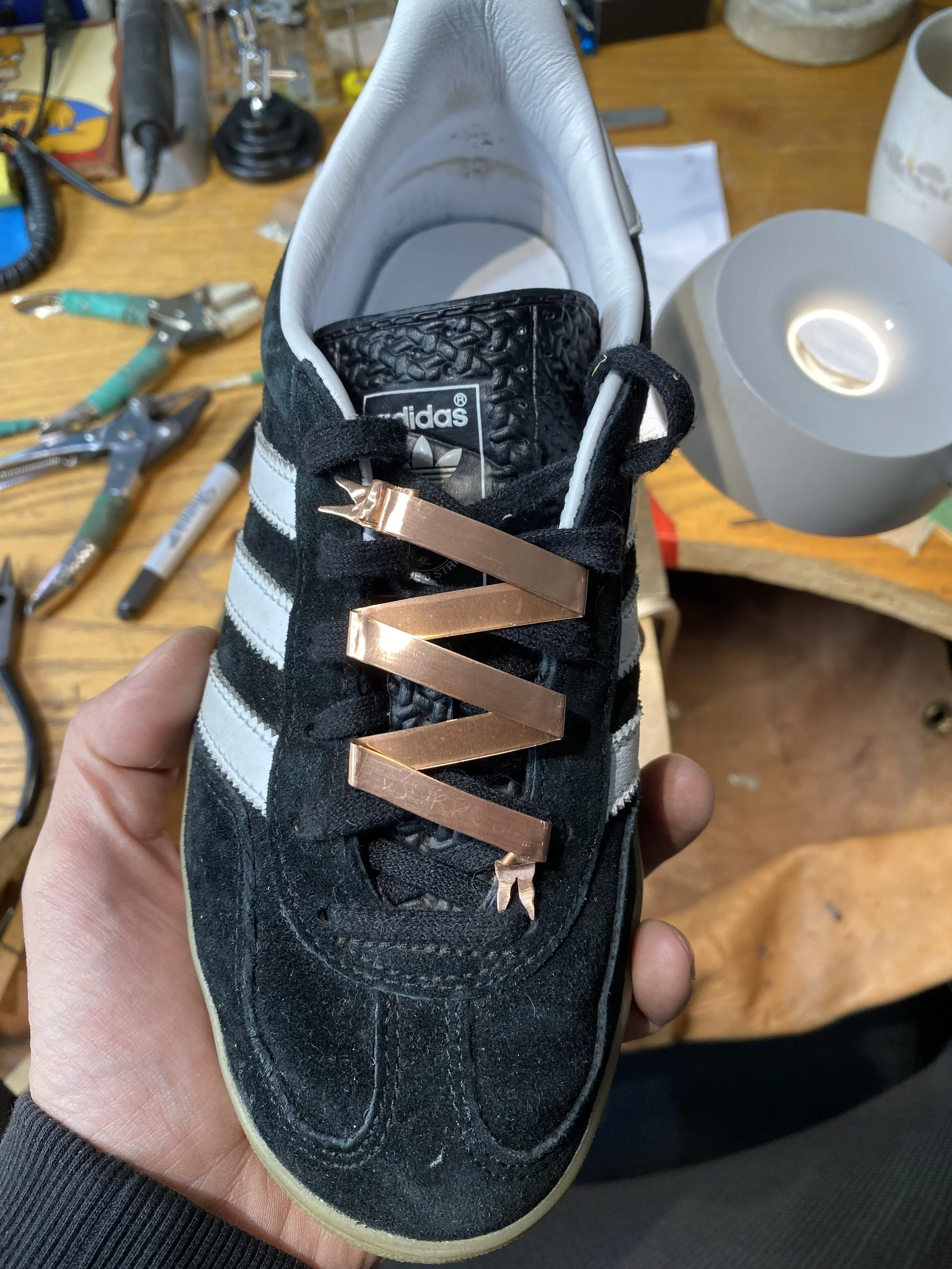 Getting a feel for how it will sit on the shoe, taking into account movement of the foot and the crease above the toes.