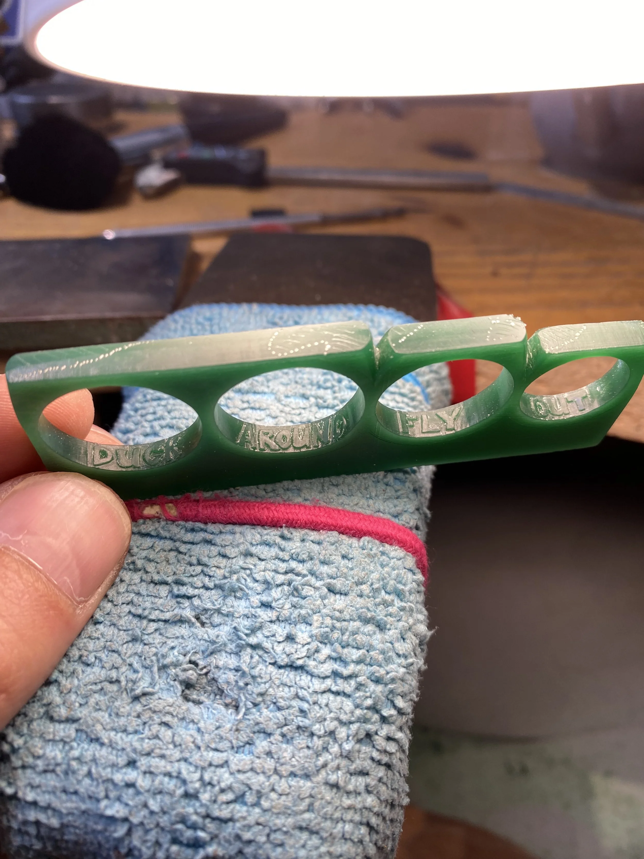 Carved them in relief but level with the finger size. Casting should take up this slight difference in finger size. 