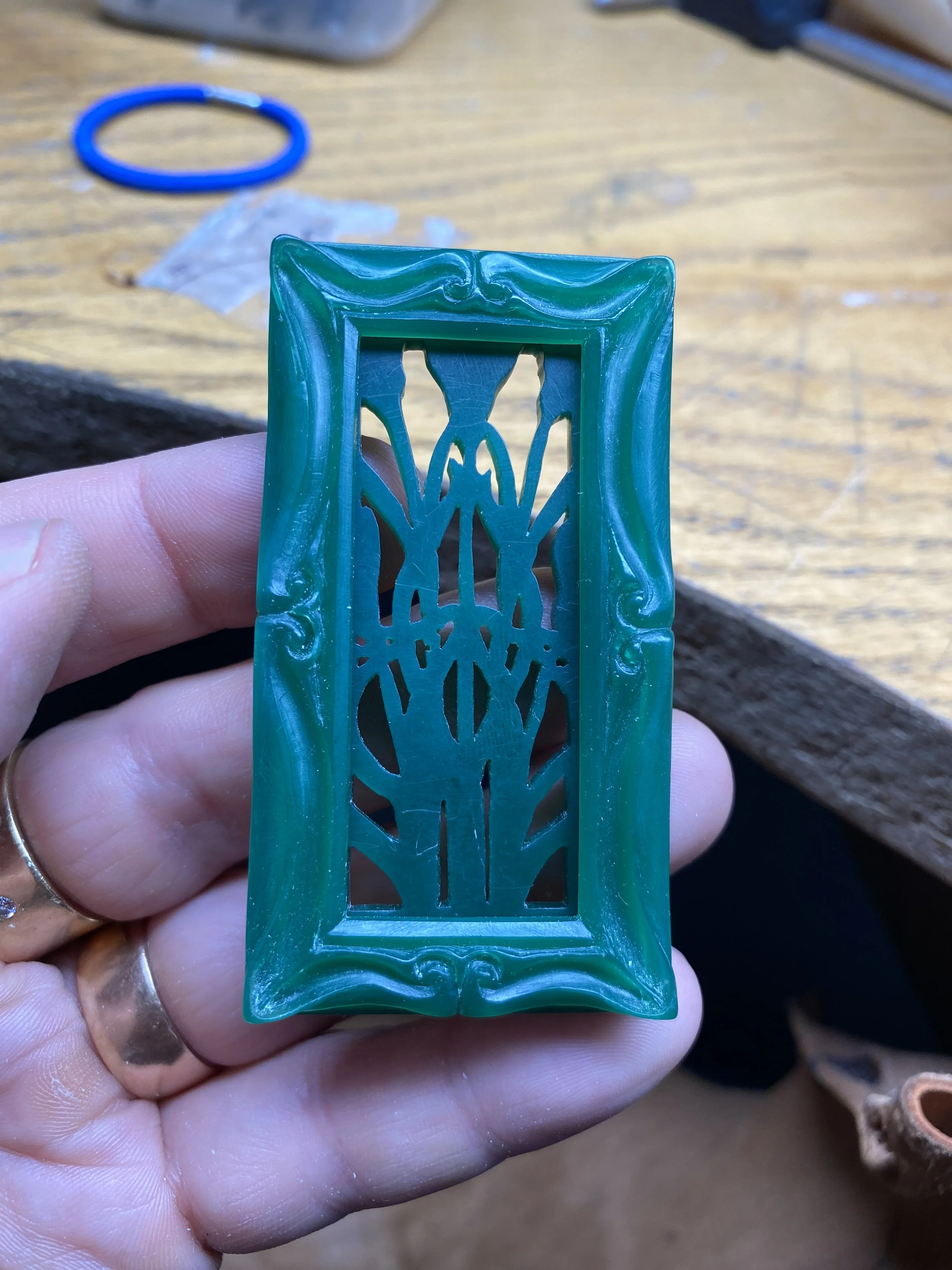 Both of the carvings shown back-to-back. You wont be able to see the back of the flower frame as the insert will cover this. 