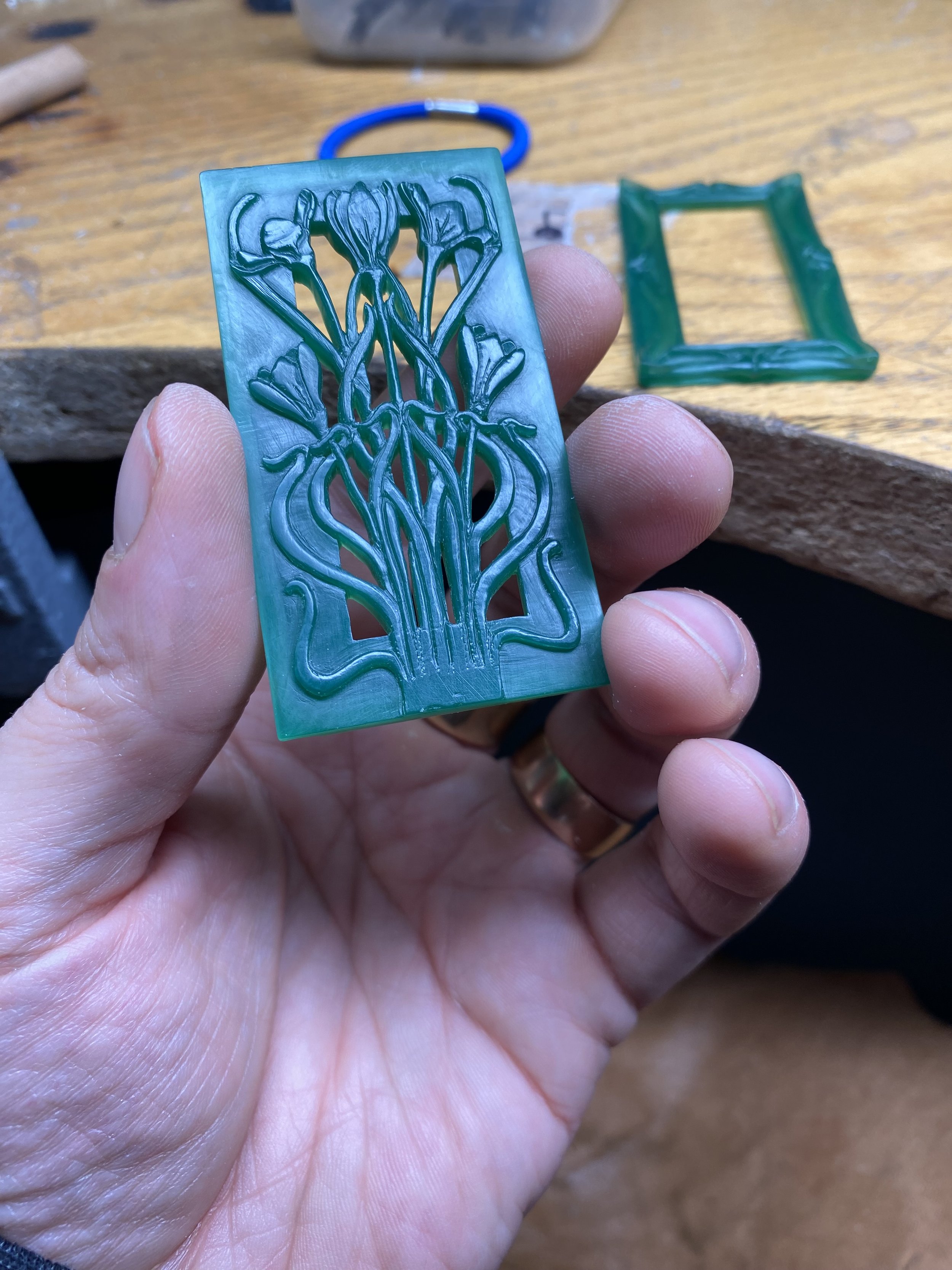 Carving deeper to give the flowers more presence. The scrolled frame in the background to use as a scale due to this possibly being a two-part piece!  