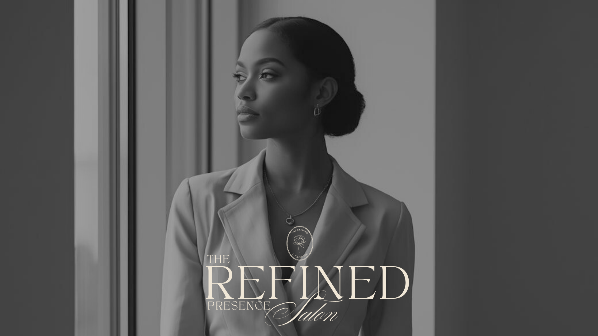 A woman with dark hair styled in a low bun looking out a window, wearing a blazer and jewelry, with text overlay 'The Refined Presence Salon'.