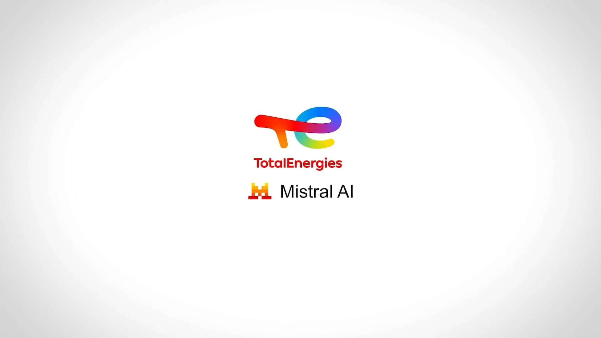 Logo de TotalEnergies avec texte 'TotalEnergies' et 'Mistral AI' sur fond blanc.