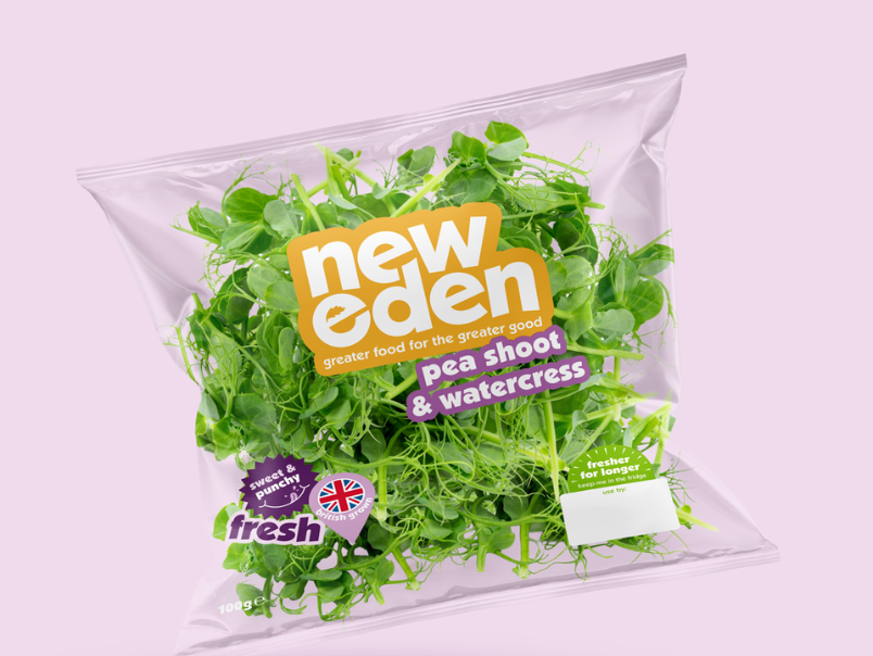 Packet of fresh peashoots and watercress from New Eden, with labels indicating 'new eden', 'pea shoot & watercress', and 'fresh'.