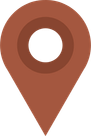 A brown map pin icon with a black circle in the center.