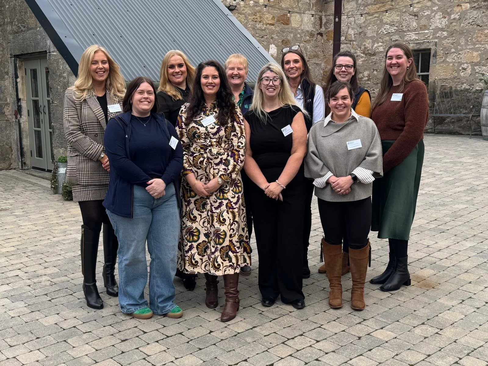 Commitee members of women in agriculture grouped for a team photo