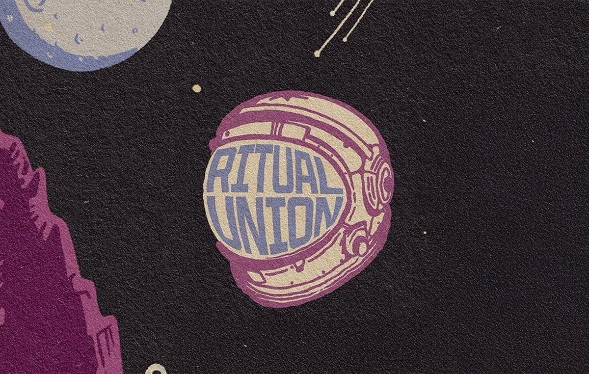A stylized illustration of an astronaut helmet with the words 'ARTUAL UNION' written inside in a space-themed design.