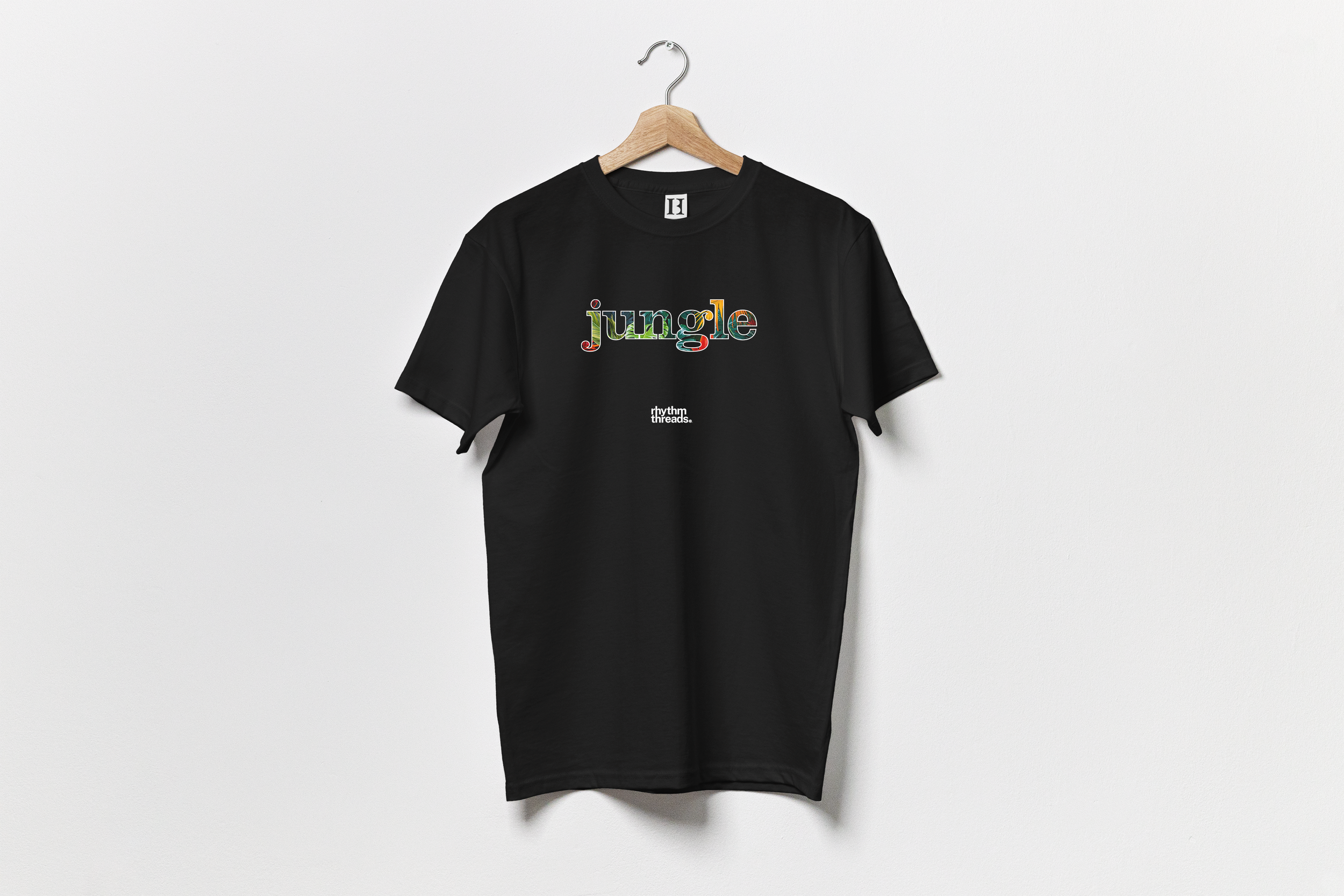 Jungle 2 on black T-Shirt mockup.png