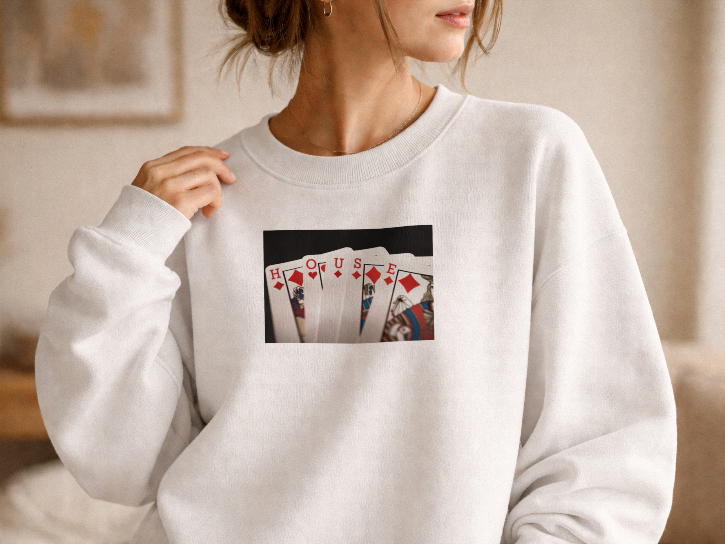 Hand of Cards - HOUSE white sweatshirt mockup.png