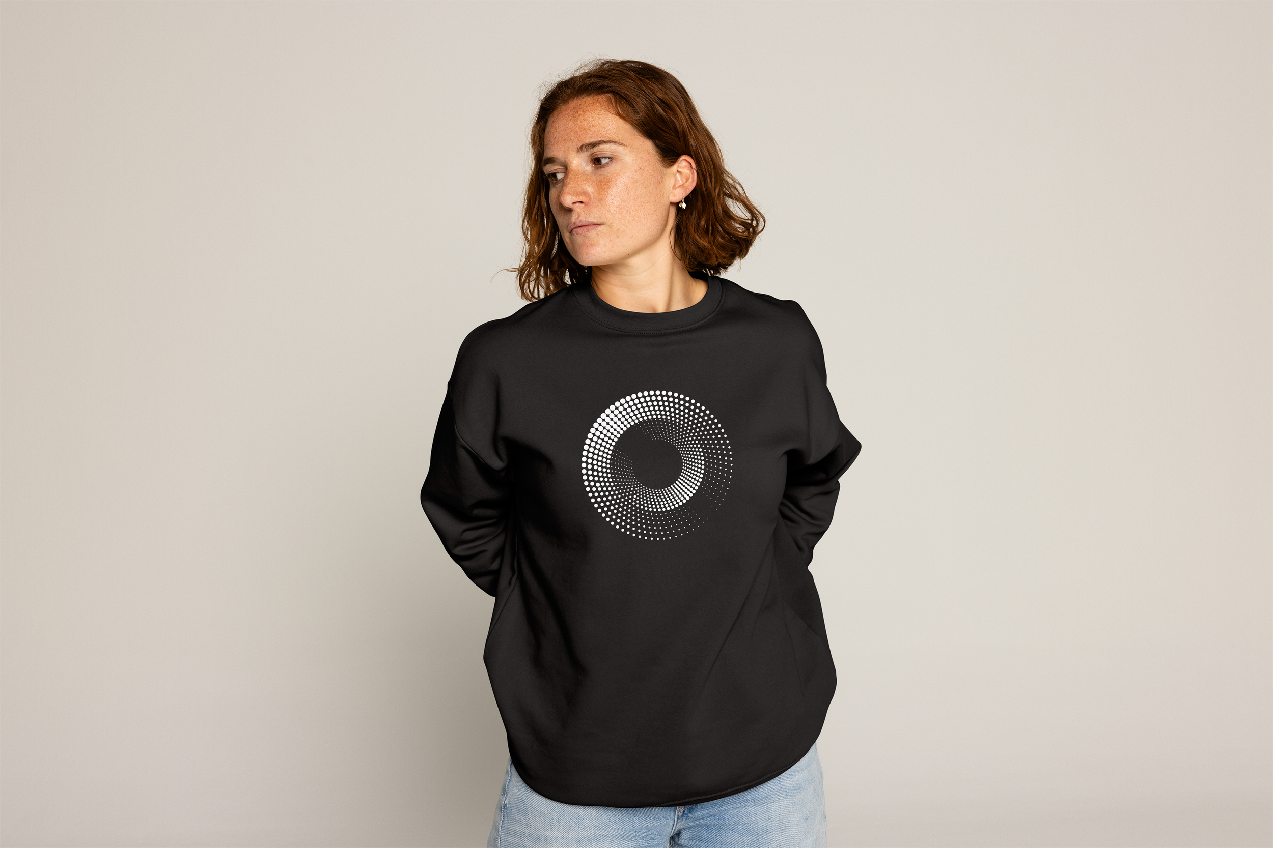 Speaker on black sweatshirt mockup.png