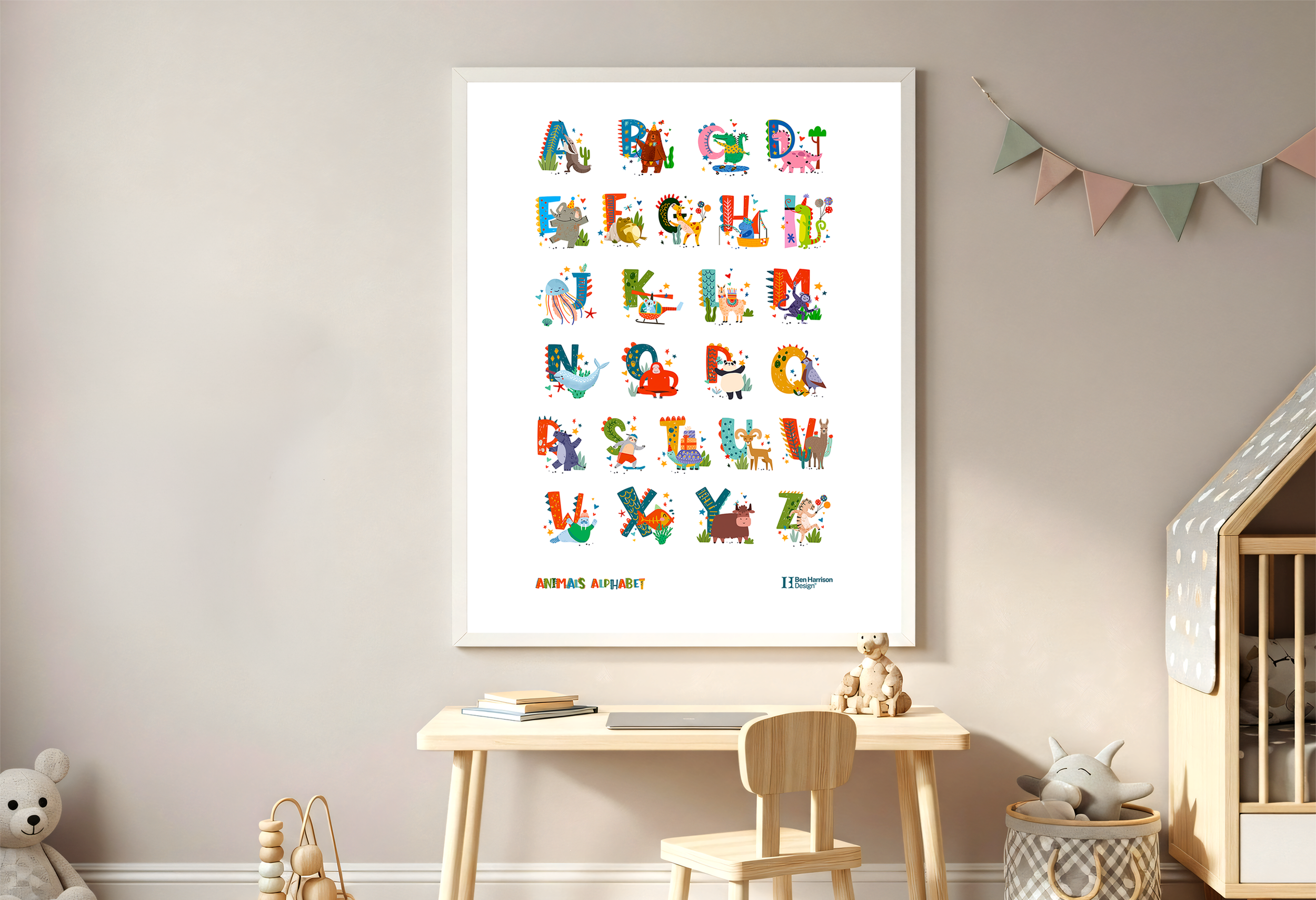 Colorful illustrated alphabet poster featuring animals and symbols, titled "Animais Alphabet," displayed on a white wall in a child's room.
