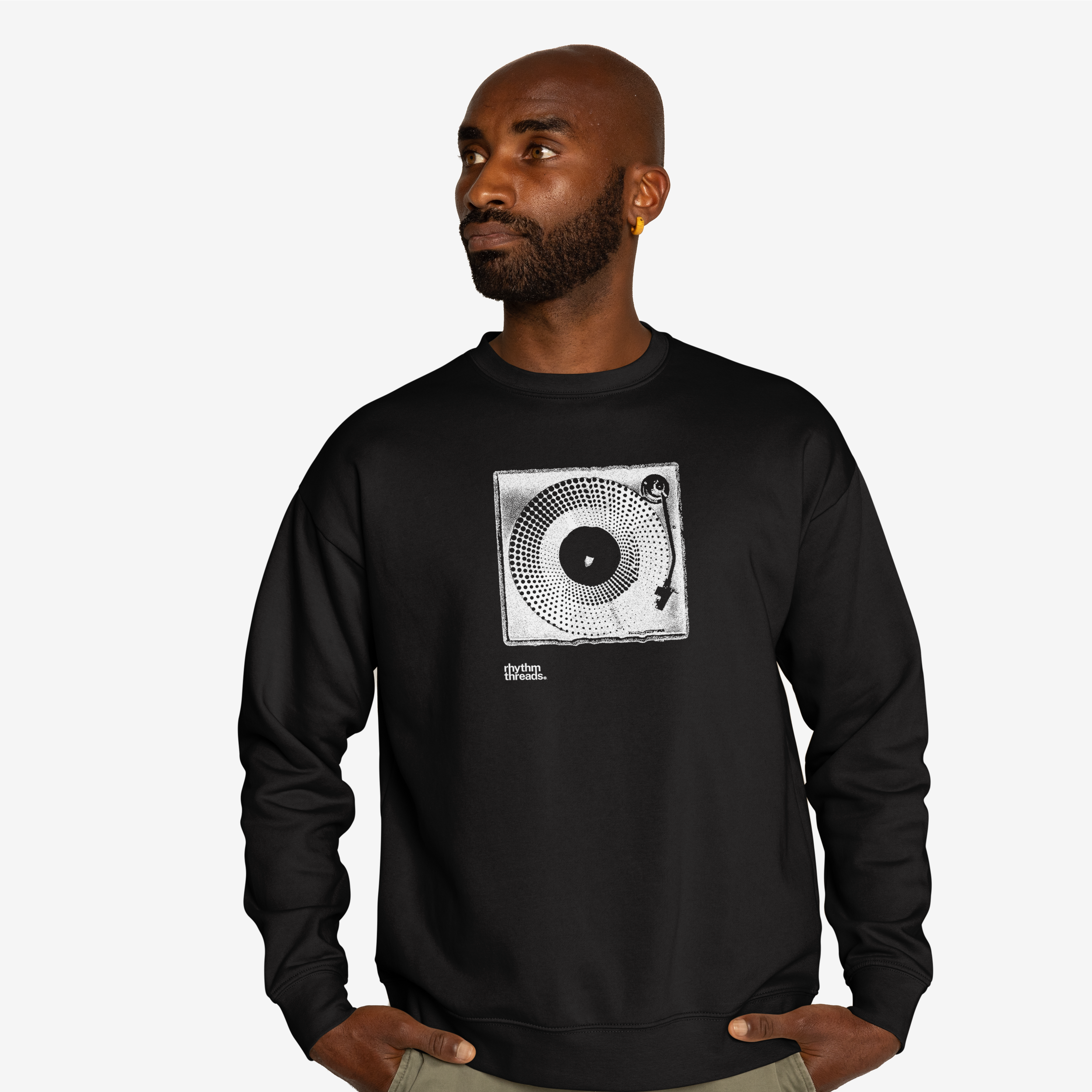 Turntable on black sweatshirt mockup.png