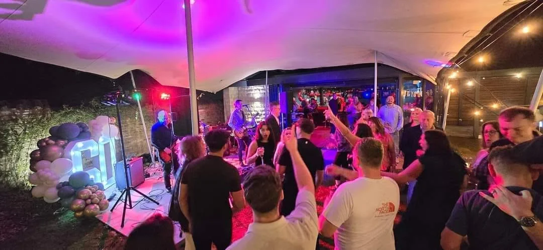 Garden party with band drinks dancing stretch tent hire leeds stretch tent rental garden party stretch tent hire Wakefield west yorkshire wedding leeds wedding beer garden marquee leeds marquee York stretch tents Manchester canopy pub shelter for
