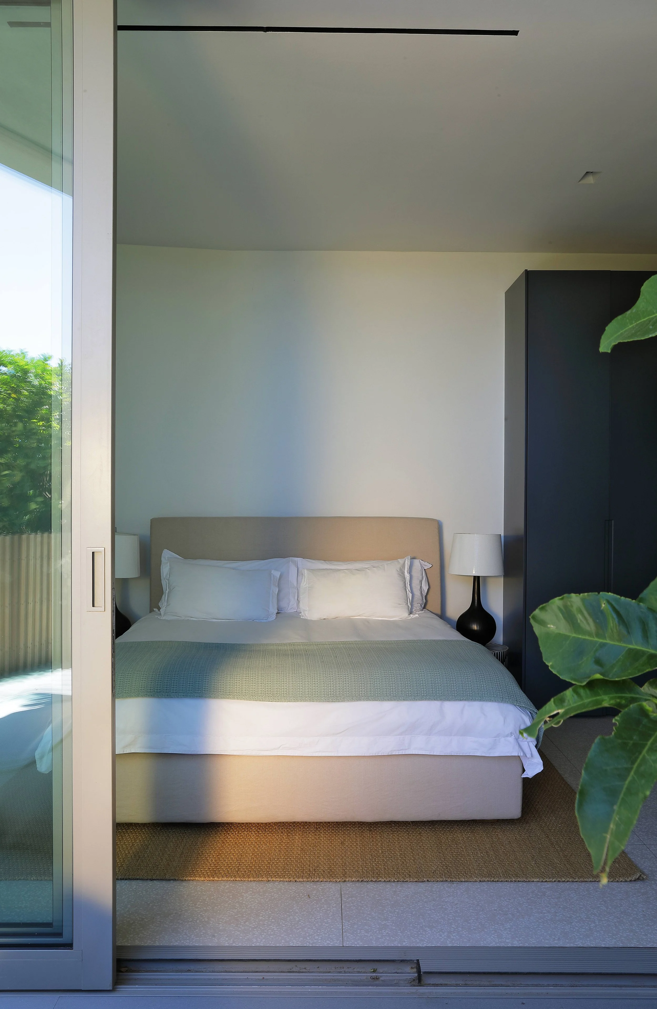 Modern concrete holiday home interior, Bespoke Beds, Camps Bay Cape Town, designed by Anja Lehne | Fabliving