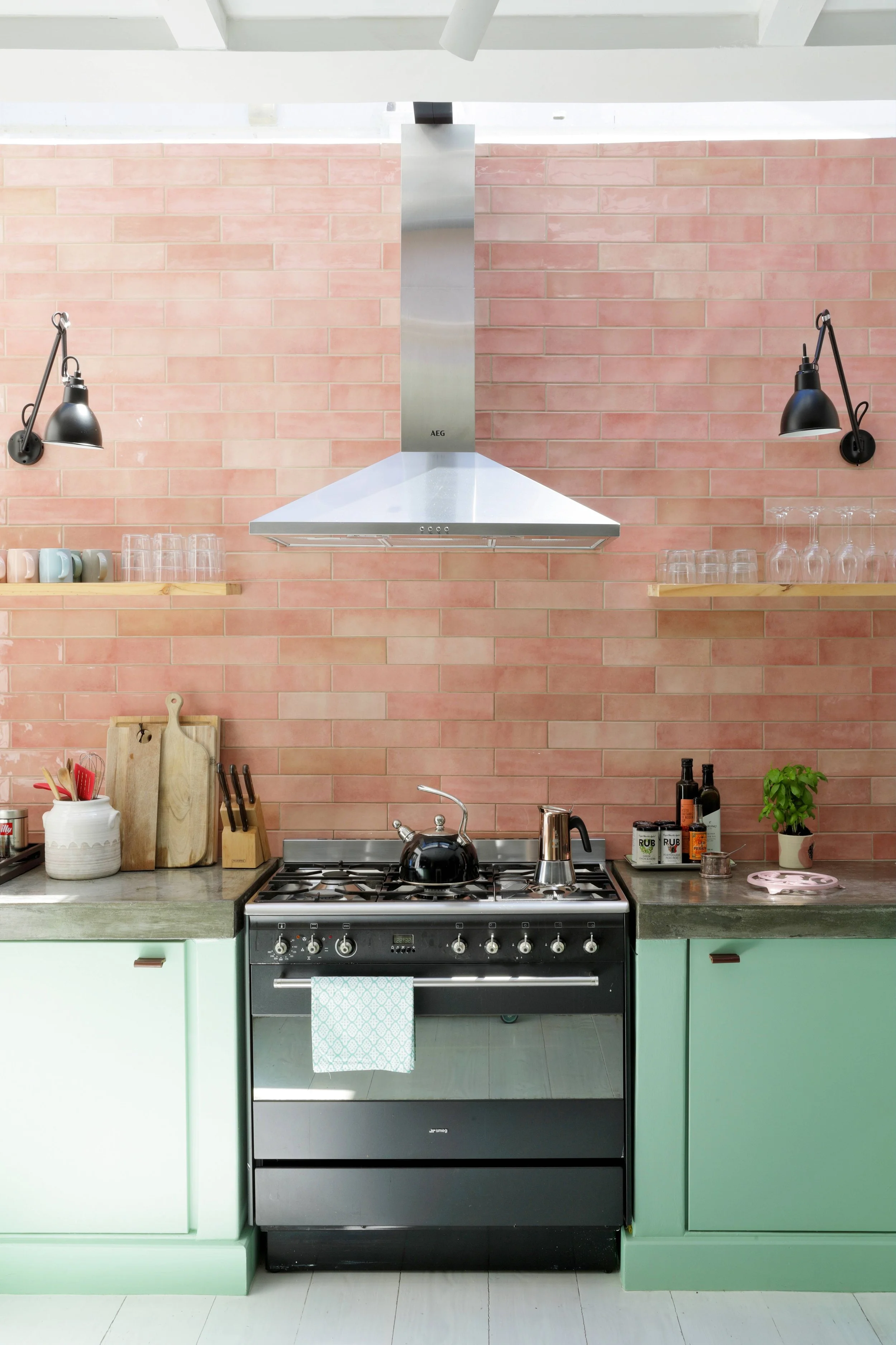 Open plan kitchen with DCW  walllightswood ceiling and coastal colour palette, Llandudno Cape Town interior design by Anja Lehne | Fabliving 