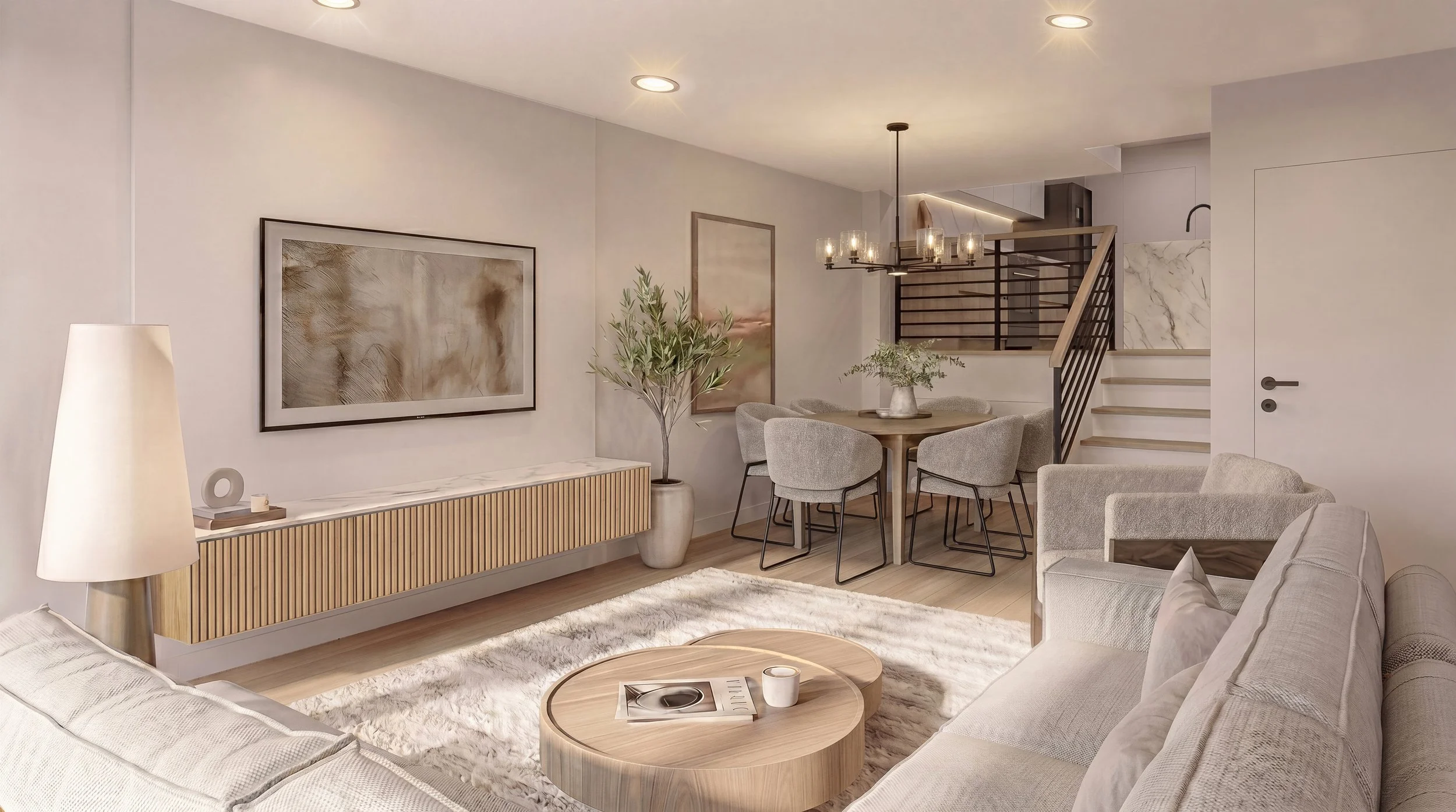 A modern, minimalist living room with beige sofas, a round wooden coffee table, a marble-topped sideboard, wall art, a tall potted plant, and a dining area with a round table and six chairs, illuminated by a chandelier and recessed ceiling lights.