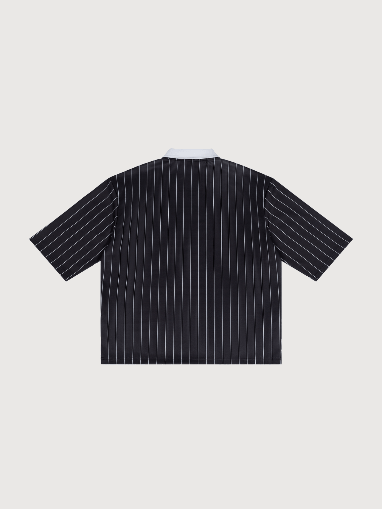 Back flat lay of luxury black pinstripe pickleball jersey designed for premium court style and modern athletic fashion by The Dinking Society.