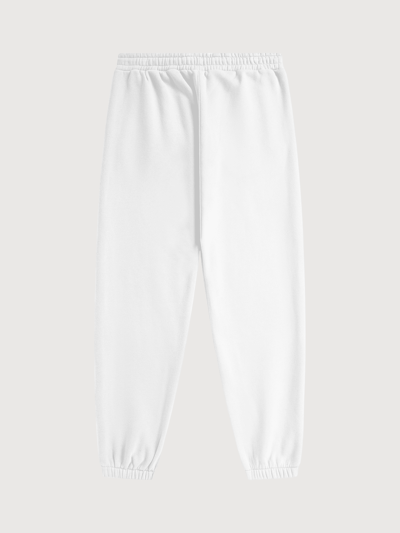 Back view of premium white jogger sweatpants with minimalist luxury athletic styling and tapered cuffed hems by The Dinking Society.