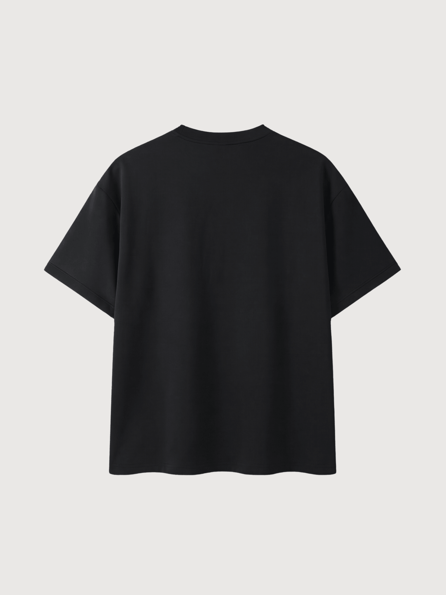 Back view of the DS Heritage Performance Tee in Caviar with clean minimalist luxury athletic design.