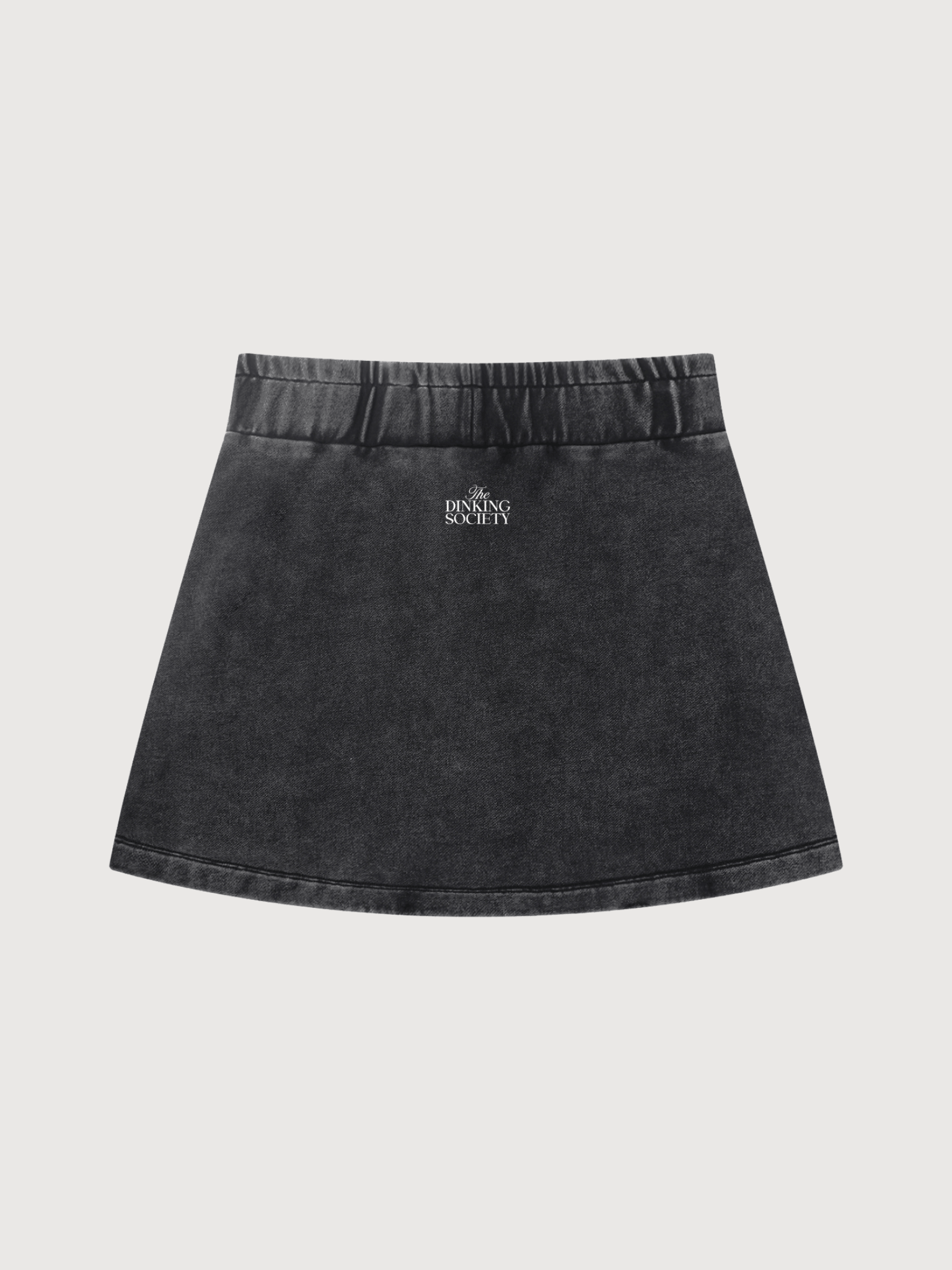 Back view of women’s pickleball skirt in black, minimal athleisure tennis skirt design