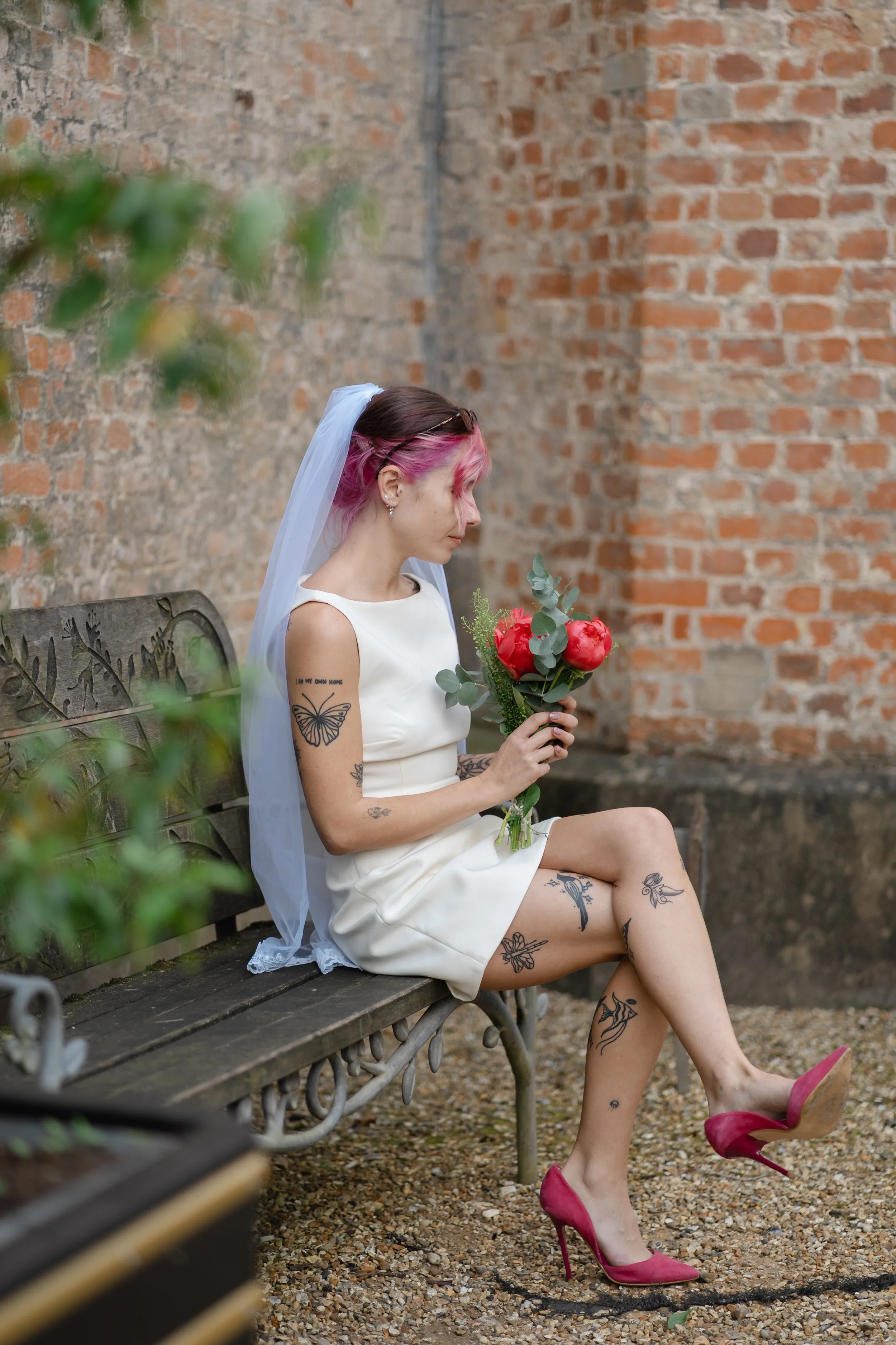 hampshire-wedding-photographer-bride-garden-bench-portrait.jpg