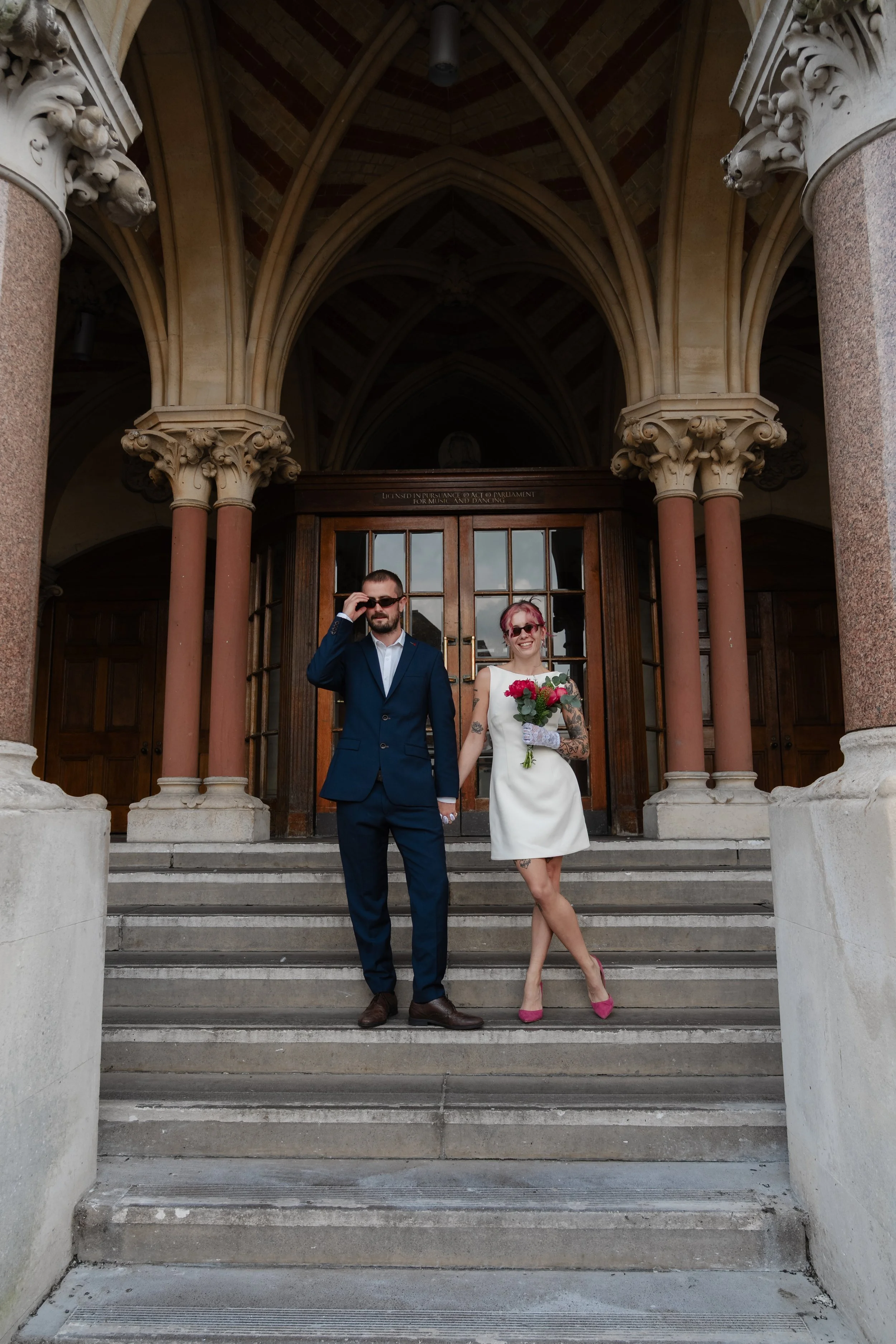 hampshire-wedding-photographer-groom-bride-stone-archway.jpg