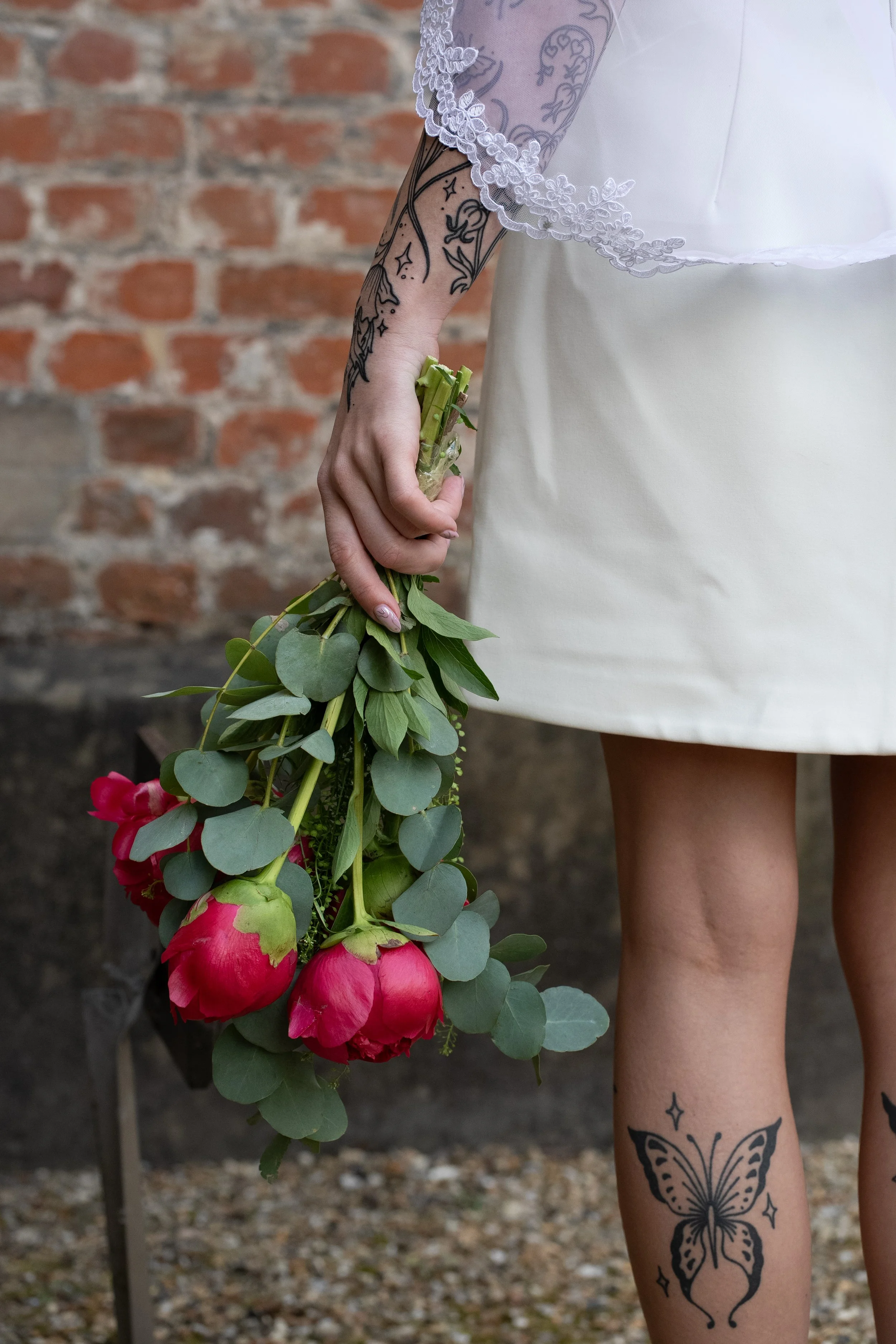 tattooed-bride-bouquet-lace-sleeve-detail.jpg