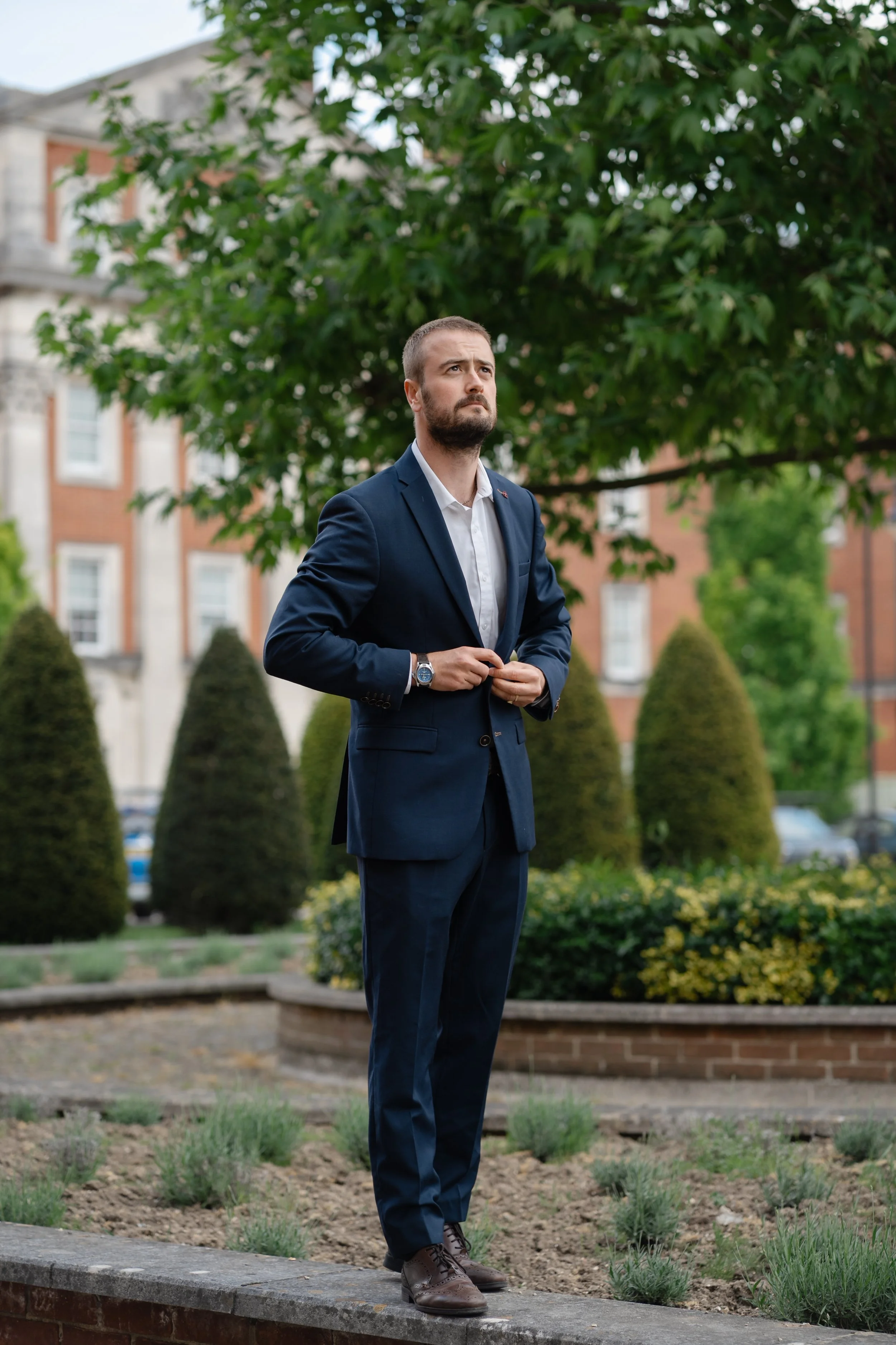 hampshire-wedding-photographer-groom-portrait-formal-garden.jpg