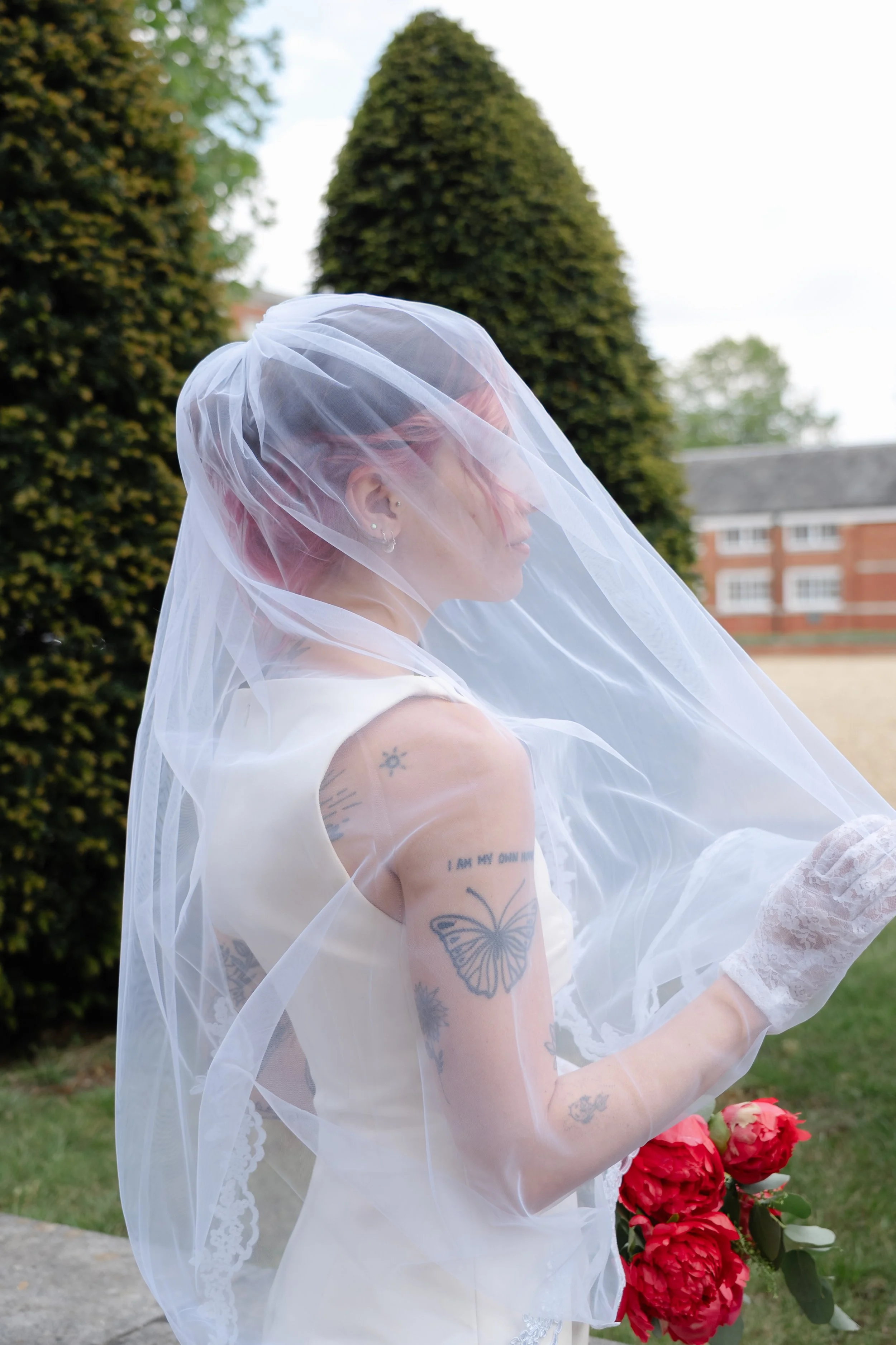 editorial-bride-veil-portrait-tattoo-detail.jpg