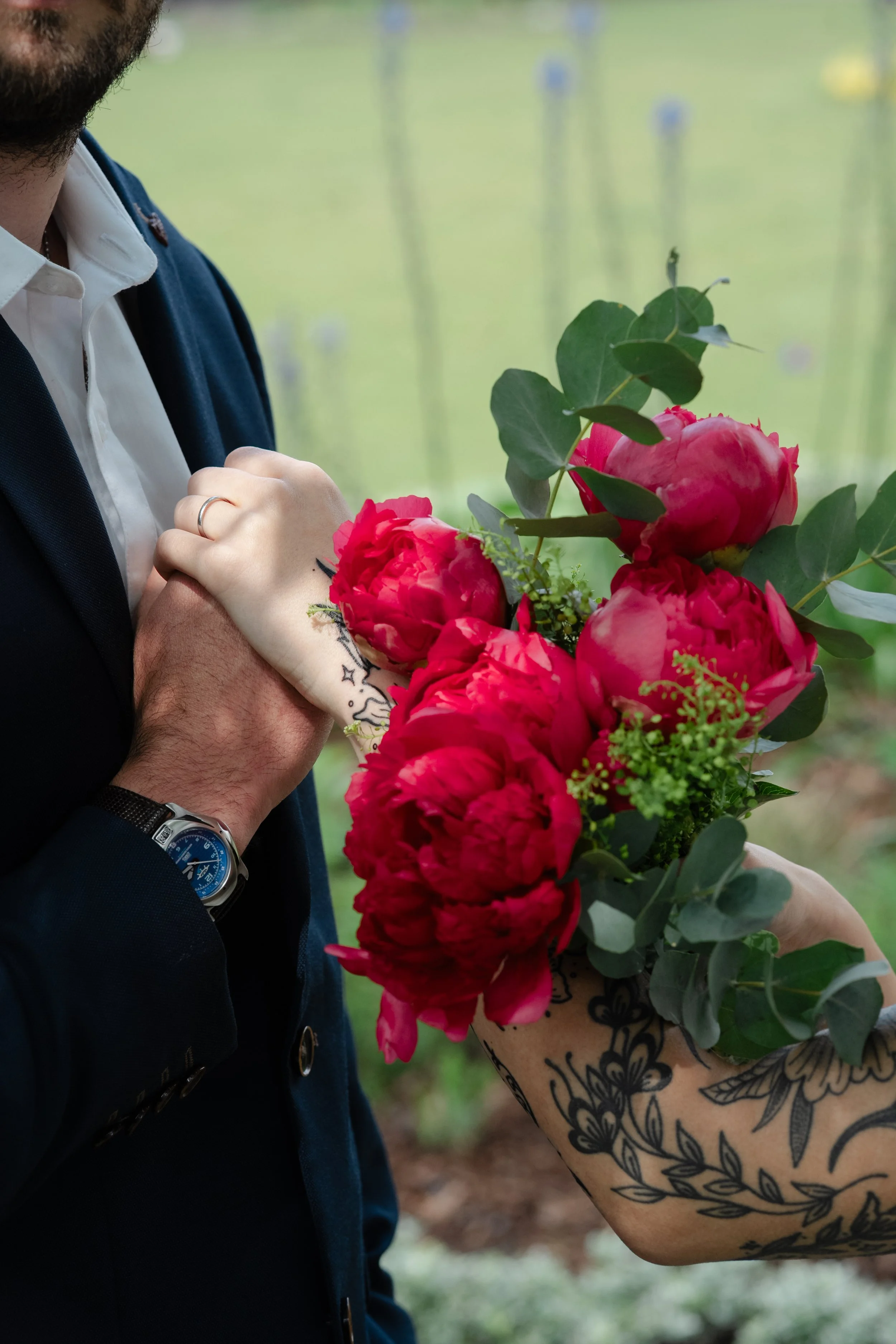 bride-groom-hands-peony-bouquet-tattoo-detail.jpg