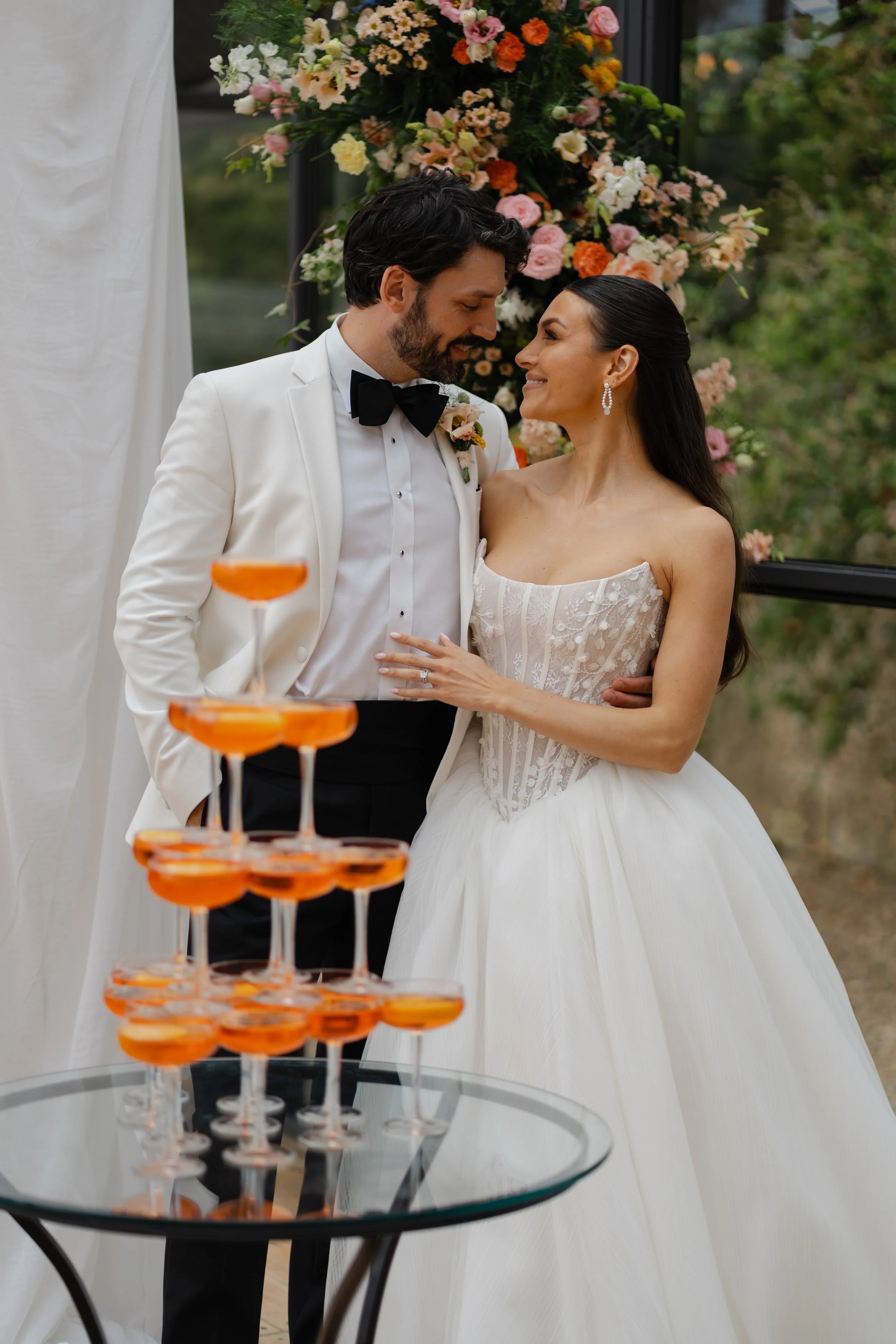 bride and groom with Aperol spritz