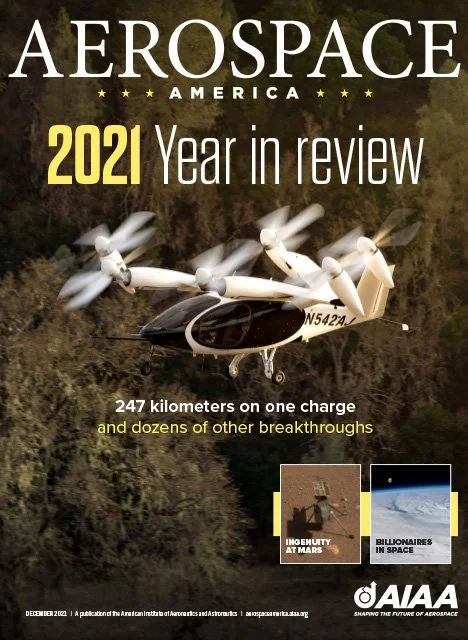 Cover of Aerospace America magazine's 2021 year-in-review issue, showing a helicopter flying over trees with the headlines about breakthroughs and space ingenuity and billionaires.