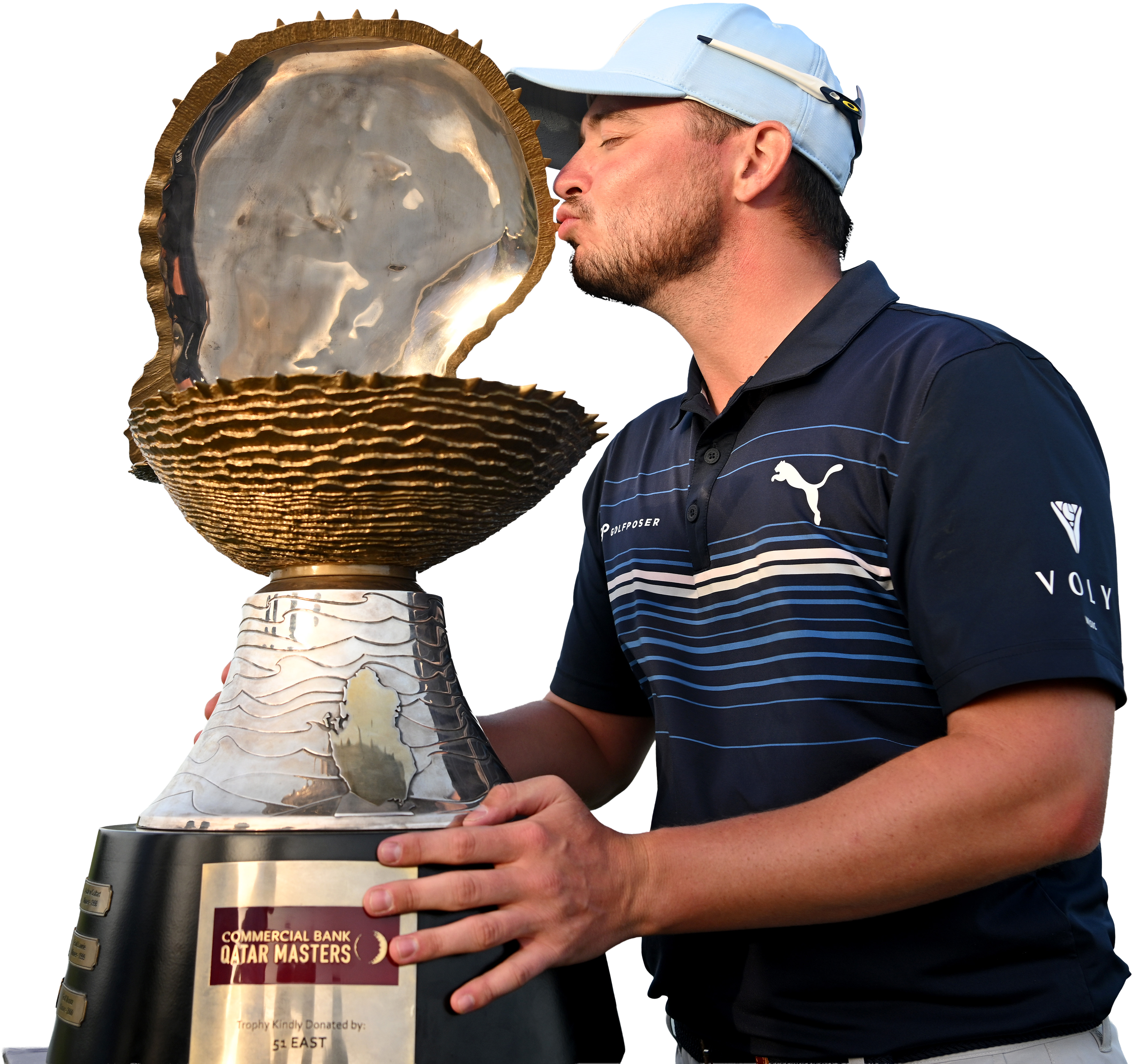 Ewen Ferguson wearing a blue cap and navy blue polo shirt holding a trophy with a reflective interior surface and a black base, inscribed with text, at an outdoor event