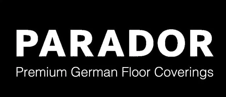 Logotipo negro con texto en blanco que dice 'PARADOR' y debajo en letras pequeñas 'Premium German Floor Coverings'.