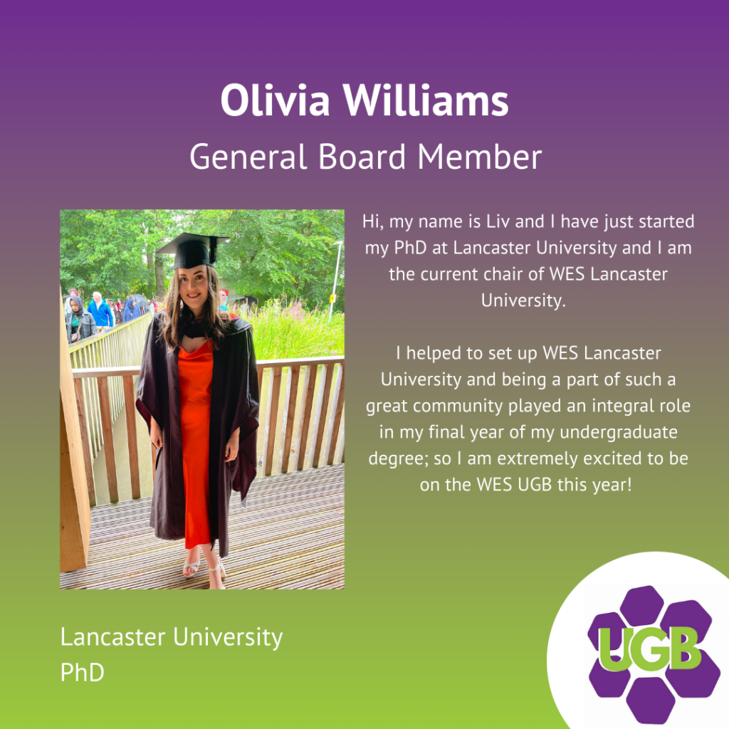 A graduate woman in a black cap and gown with an orange dress underneath standing on a wooden balcony with a forested background, part of a University graduation poster for Olivia Williams, a general board member at Lancaster University.